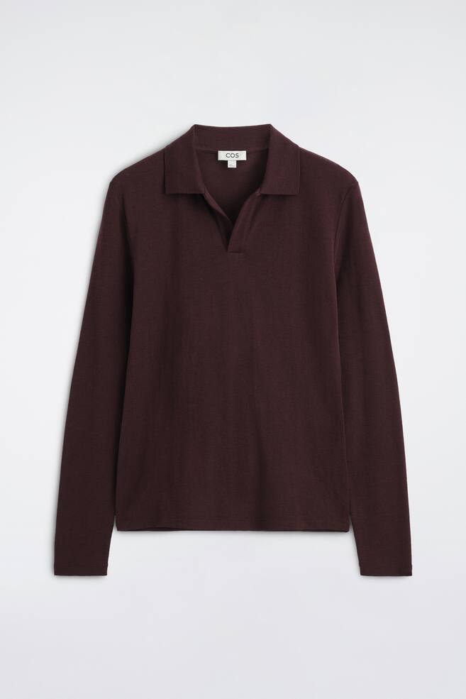 A slim wool-jersey open-collar polo shirt in deep burgundy is shown from the front, featuring long sleeves, a buttonless open collar, and a straight hem. - 1