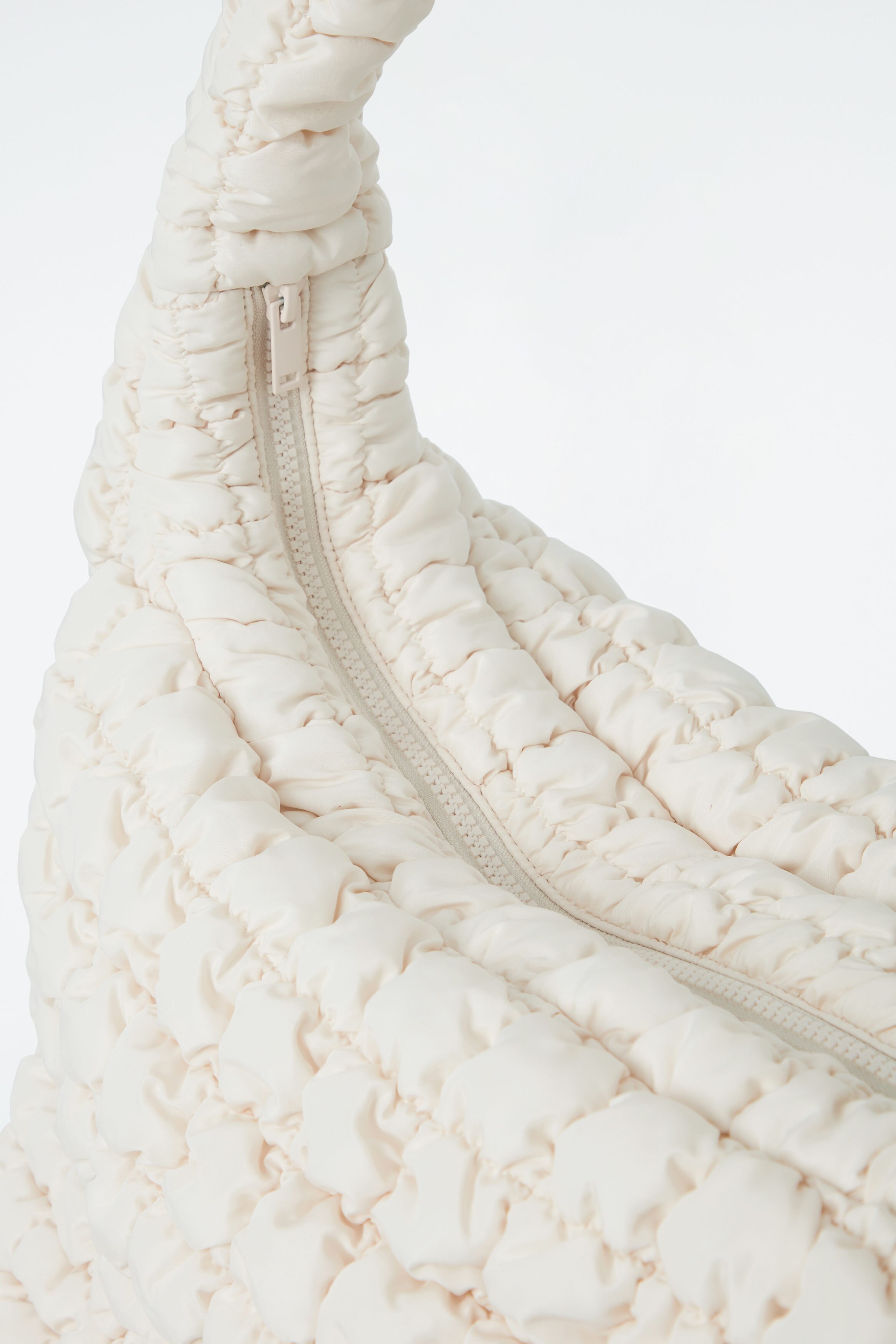 OVERSIZED QUILTED CROSSBODY BAG - LIGHT BEIGE | COS