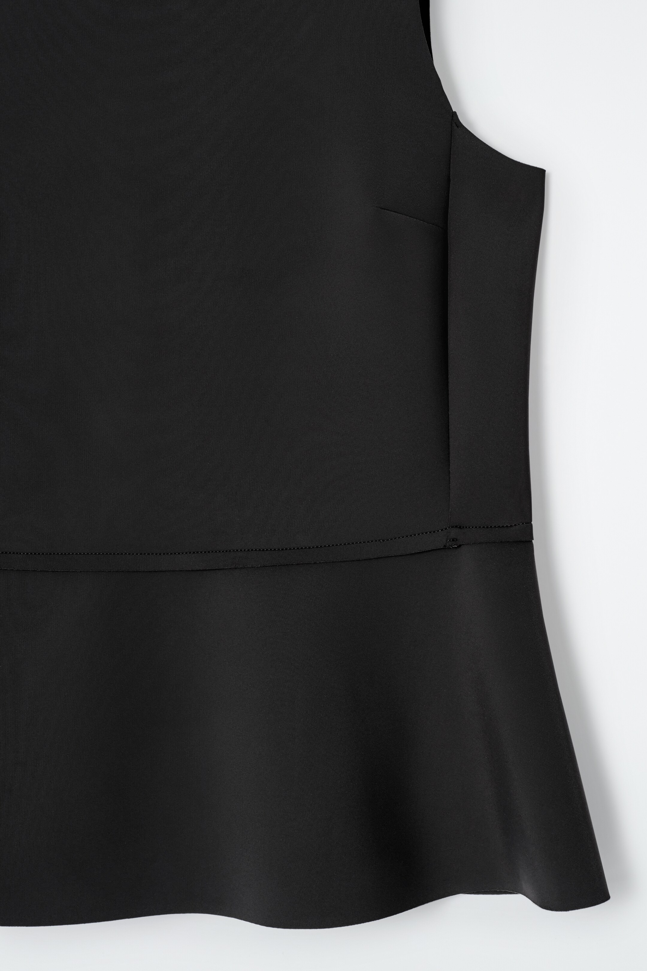 Visa större bild: PEPLUMLINNE I SCUBA - SVART - DAM | H&M SE 8