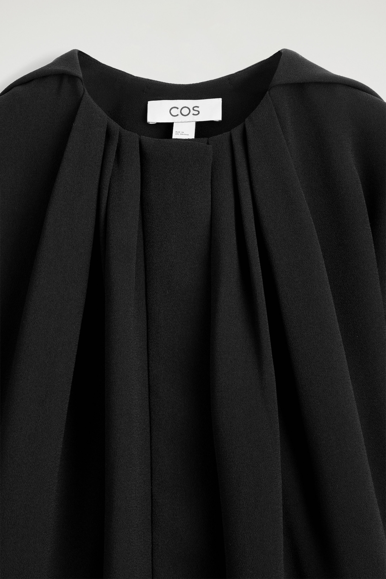 VOLUMINOUS PLEATED BLOUSE - BLACK | COS US
