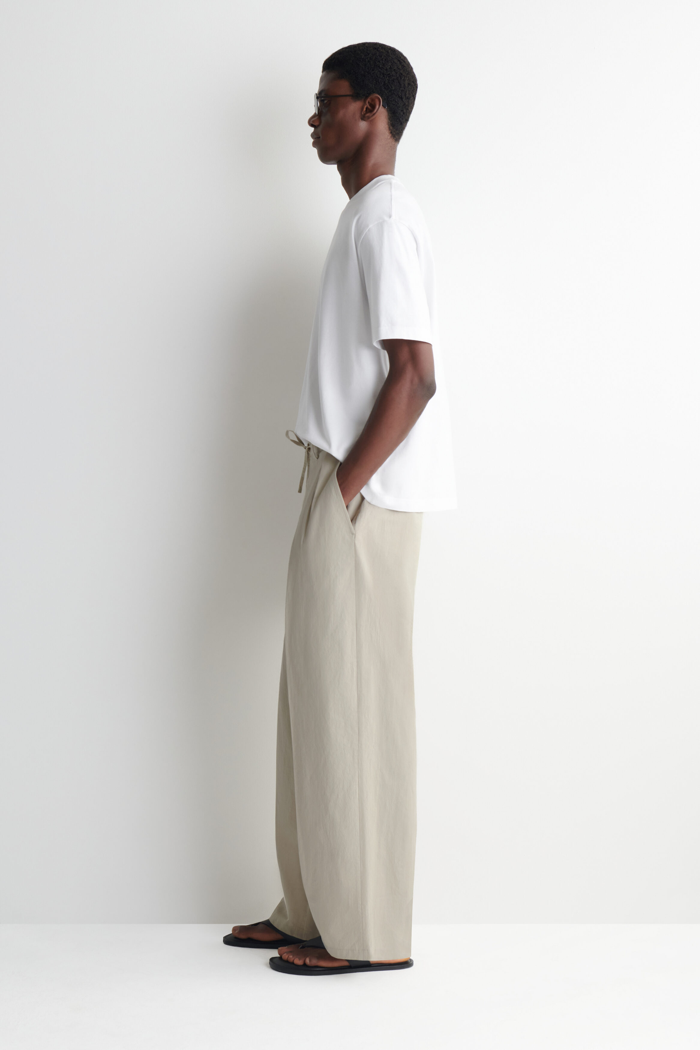 COTTON RELAXED WIDE-LEG DRAWSTRING PANTS - BEIGE | COS US