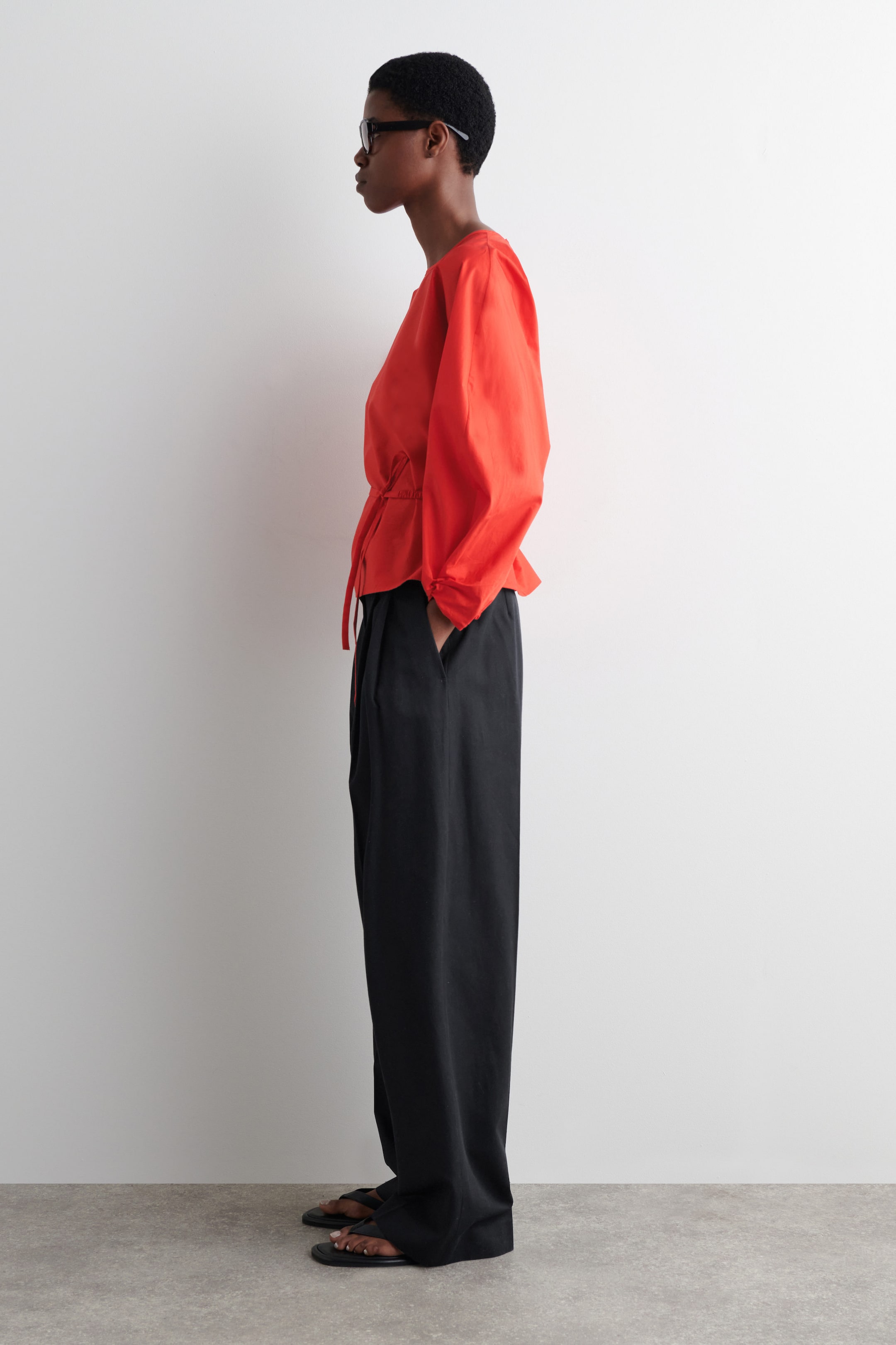 BLOUSE PÉPLUM À CORDON DE SERRAGE