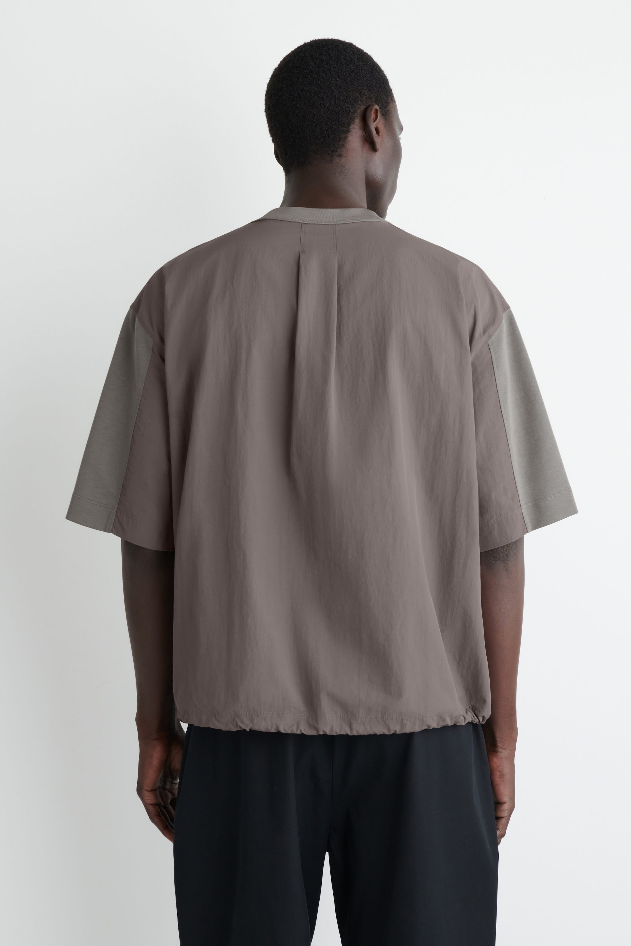 OVERSIZED PANELED DRAWSTRING T-SHIRT
