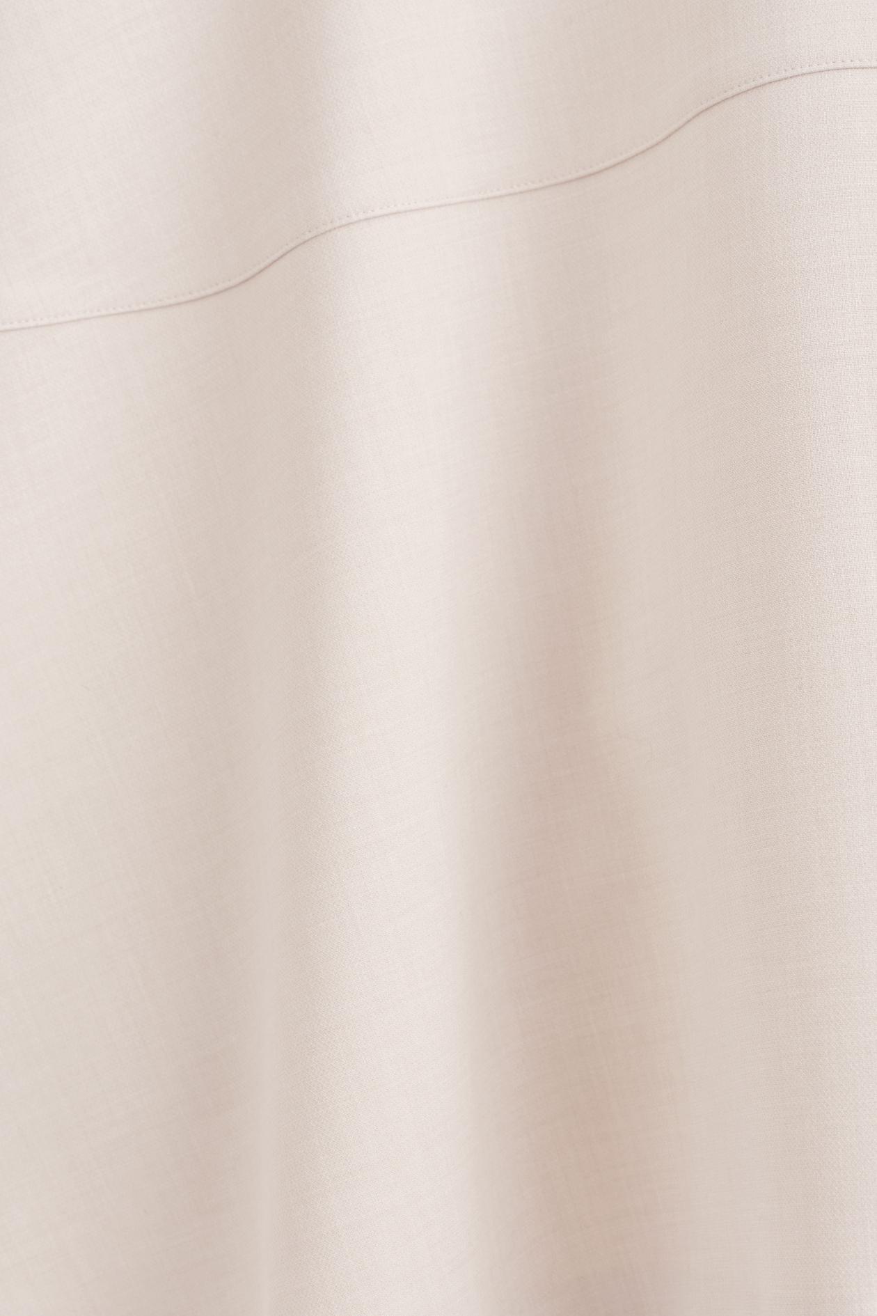 CURVED A-LINE MIDI SKIRT — LIGHT BEIGE