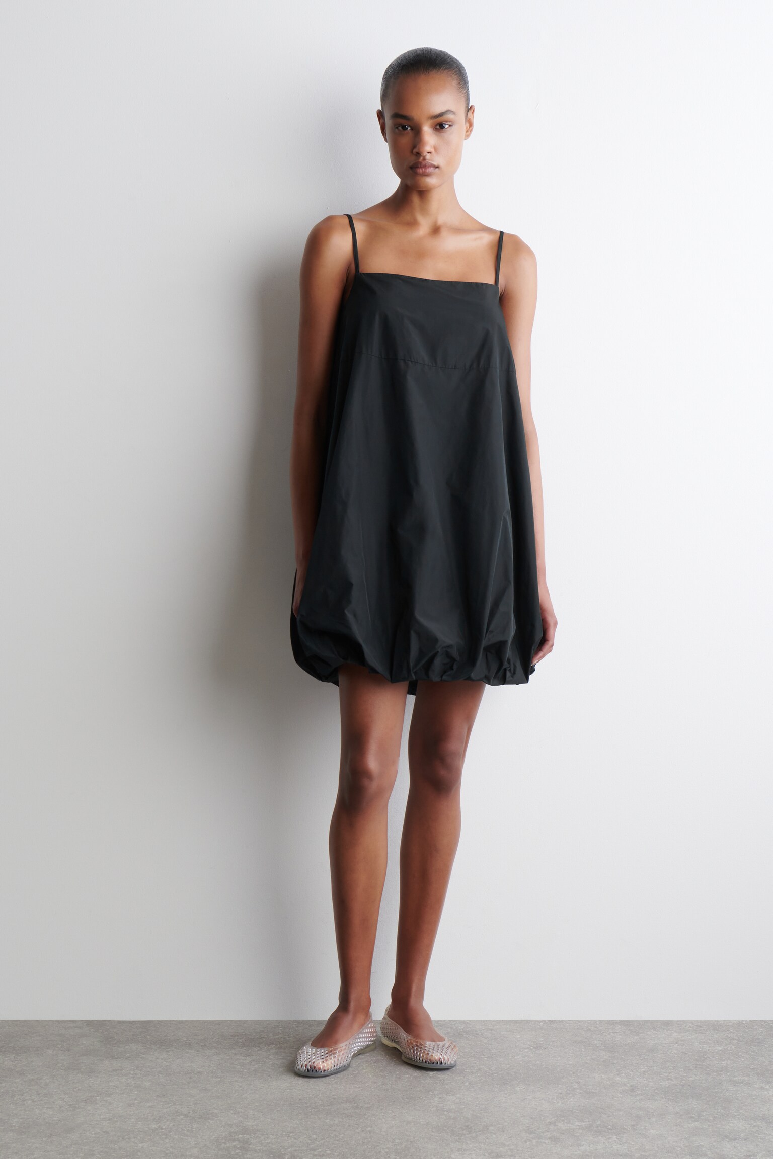 BUBBLE-HEM MINI DRESS - BLACK