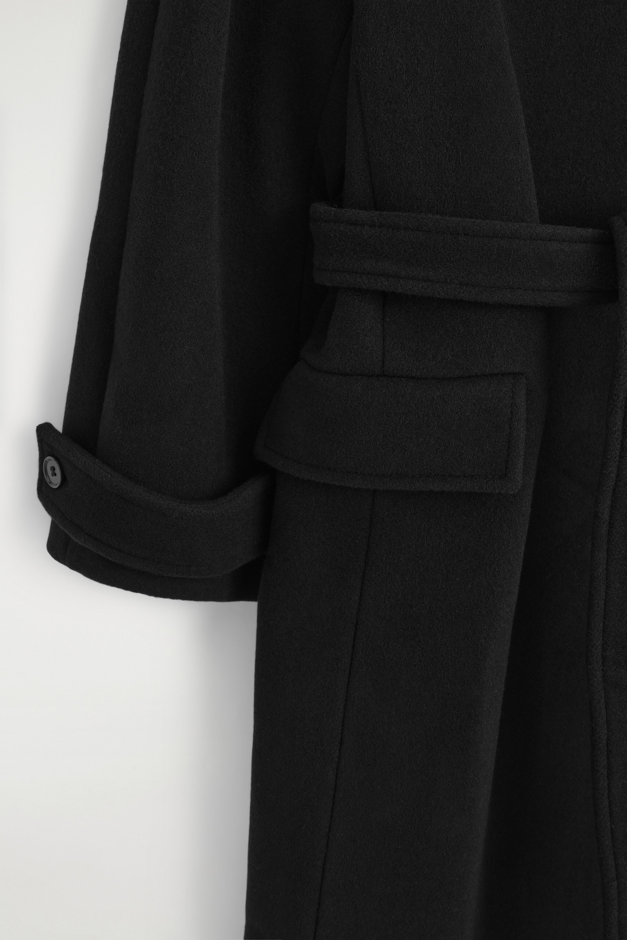 BELTED WOOL-BLEND MOCK-NECK COAT — BLACK