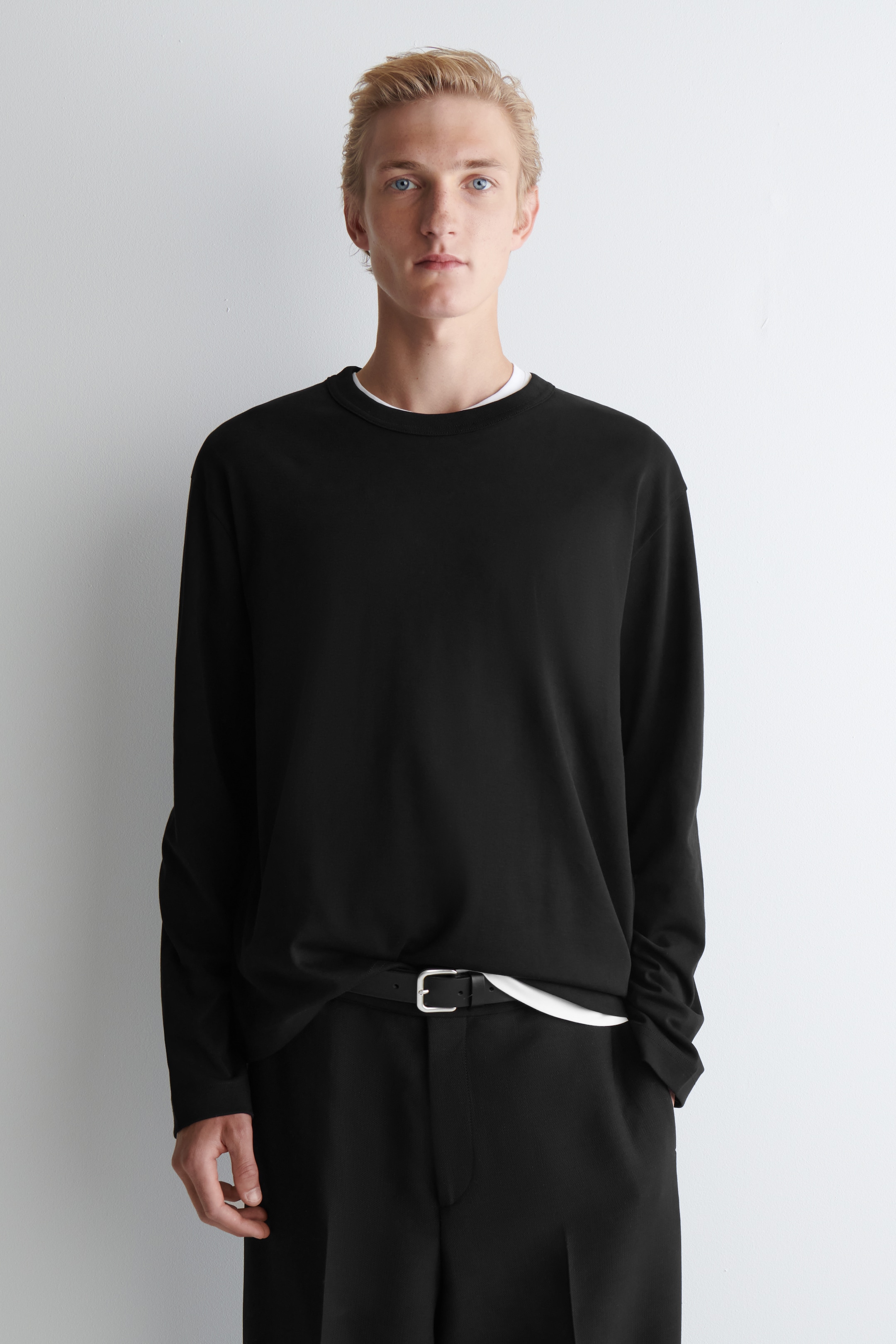 Grotere afbeelding bekijken: Relaxed jersey interlock T-shirt met lange mouwen - ZWART - HEREN | H&M BE 1