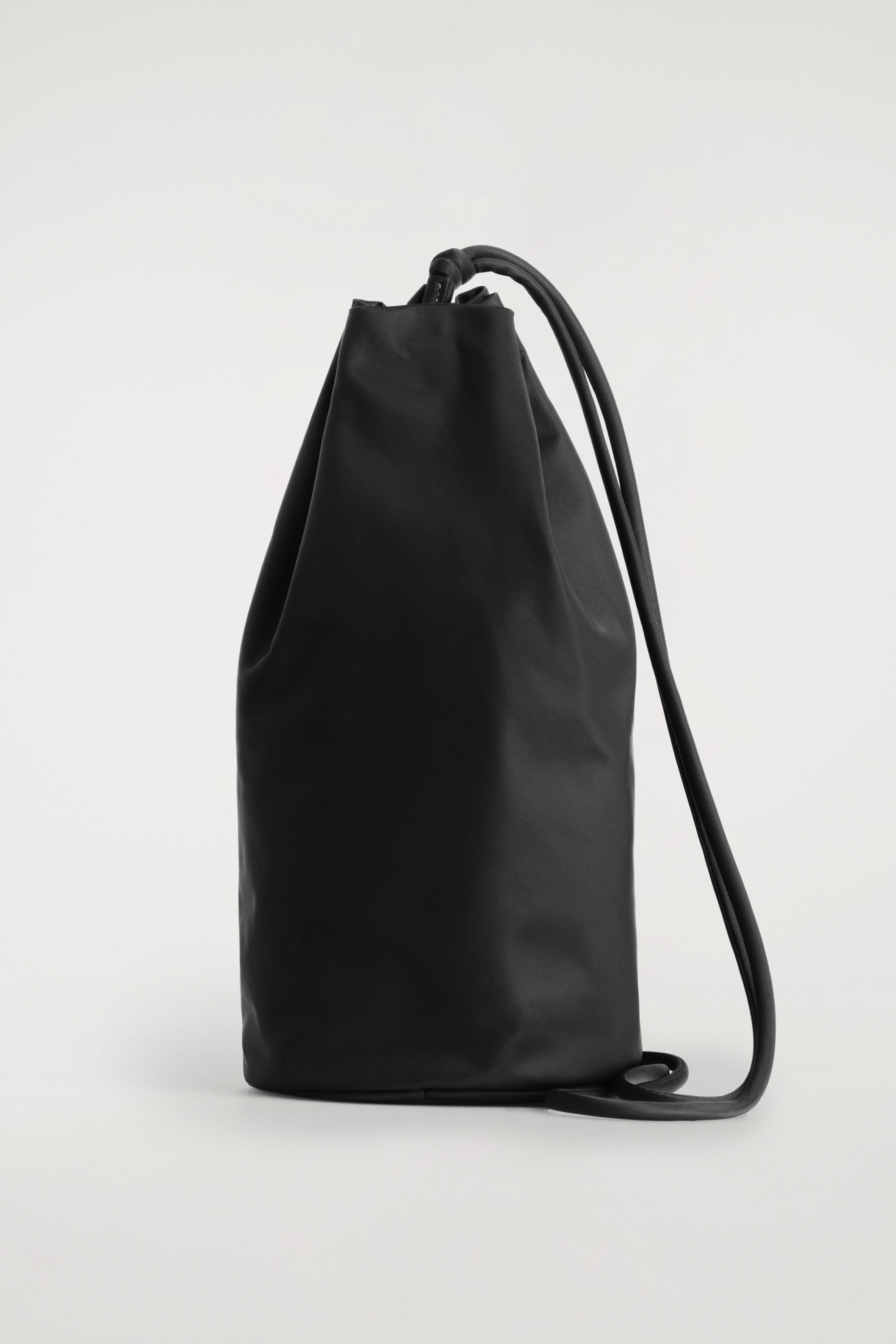 DRAWSTRING CROSSBODY BAG - NYLON - BLACK | COS US DRAWSTRING CROSSBODY BAG - NYLON - BLACK | COS US