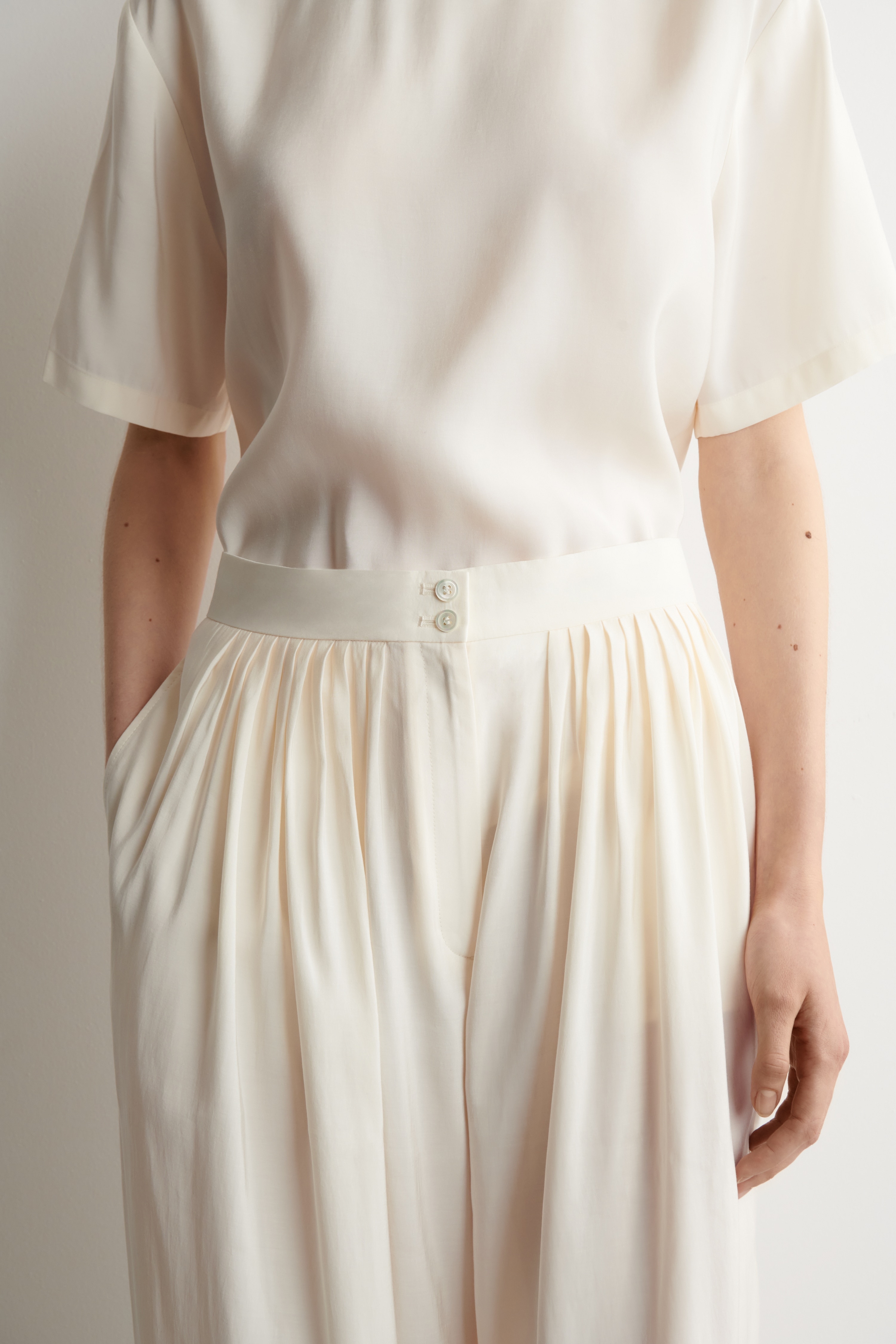 DRAPED PLEATED STRAIGHT-LEG TROUSERS