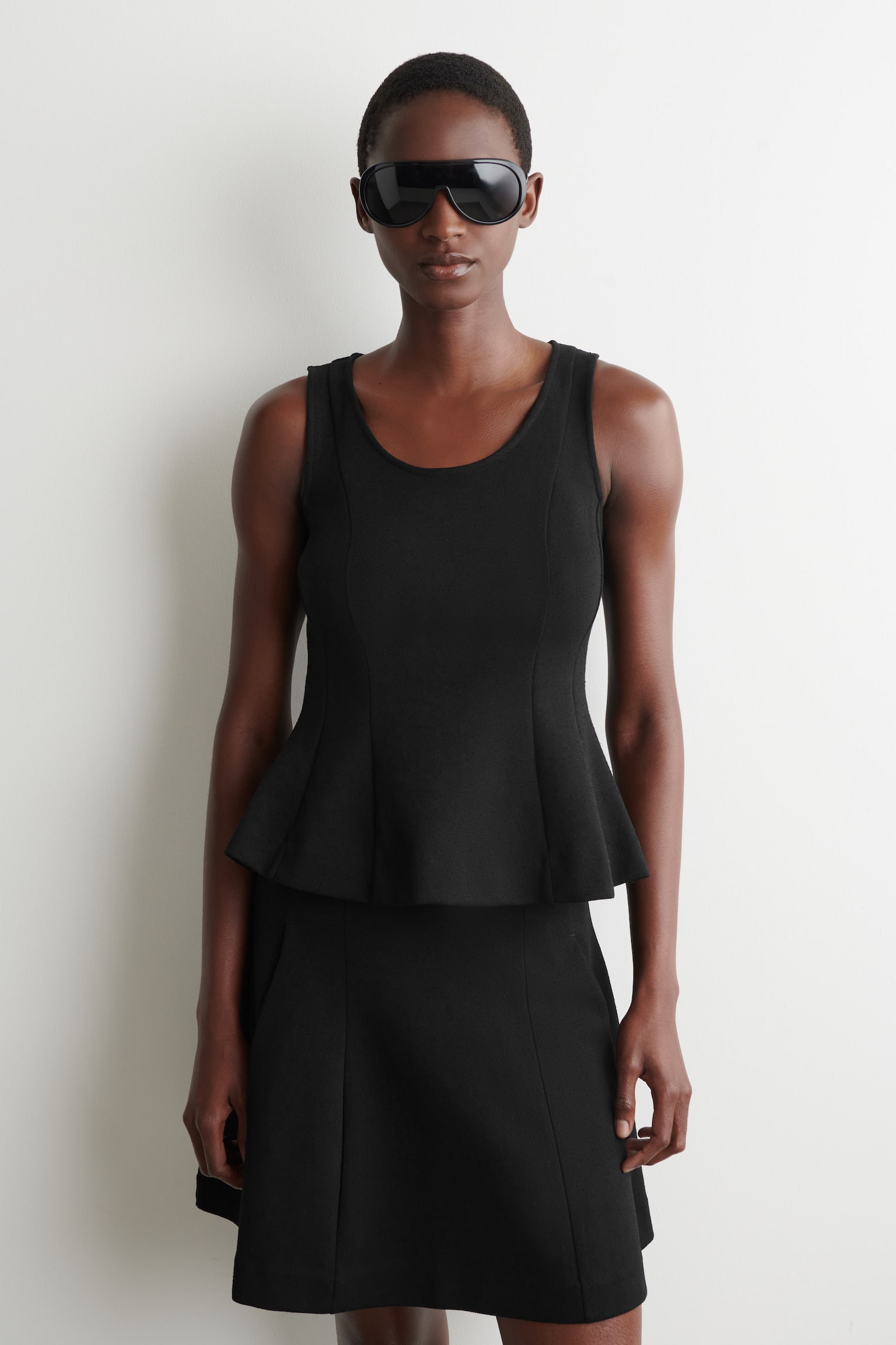 TOP IN JERSEY CON PANNELLI SCULTOREI - NERO - 1