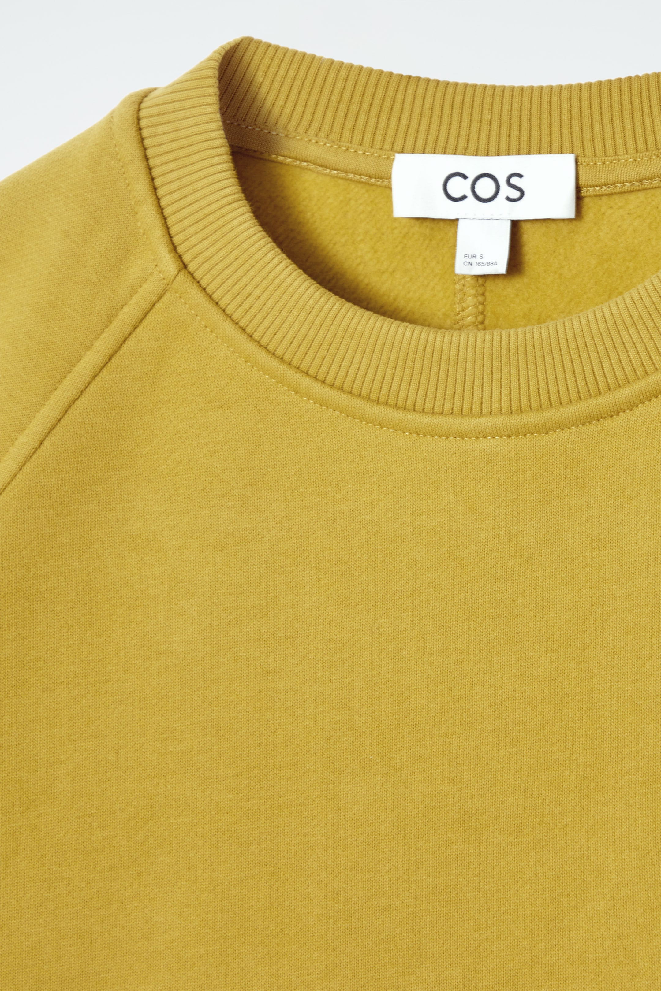 Grösseres Bild ansehen: BAUMWOLLJERSEY-SWEATSHIRT MIT KOKONSILHOUETTE - Senffarben - DAMEN | H&M CH 8