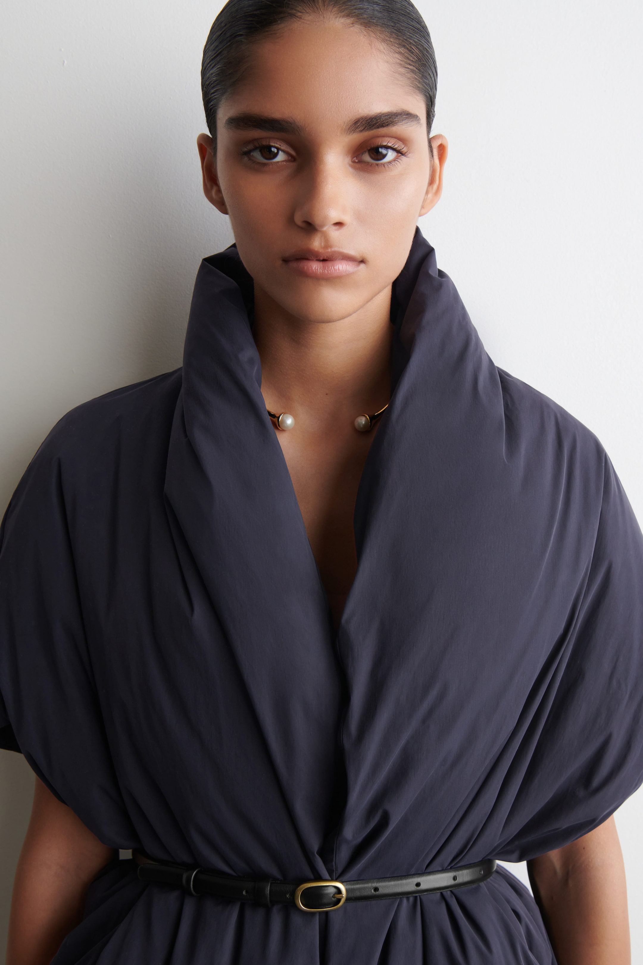 PLUMÍFERO OVERSIZE CON CUELLO CHAL