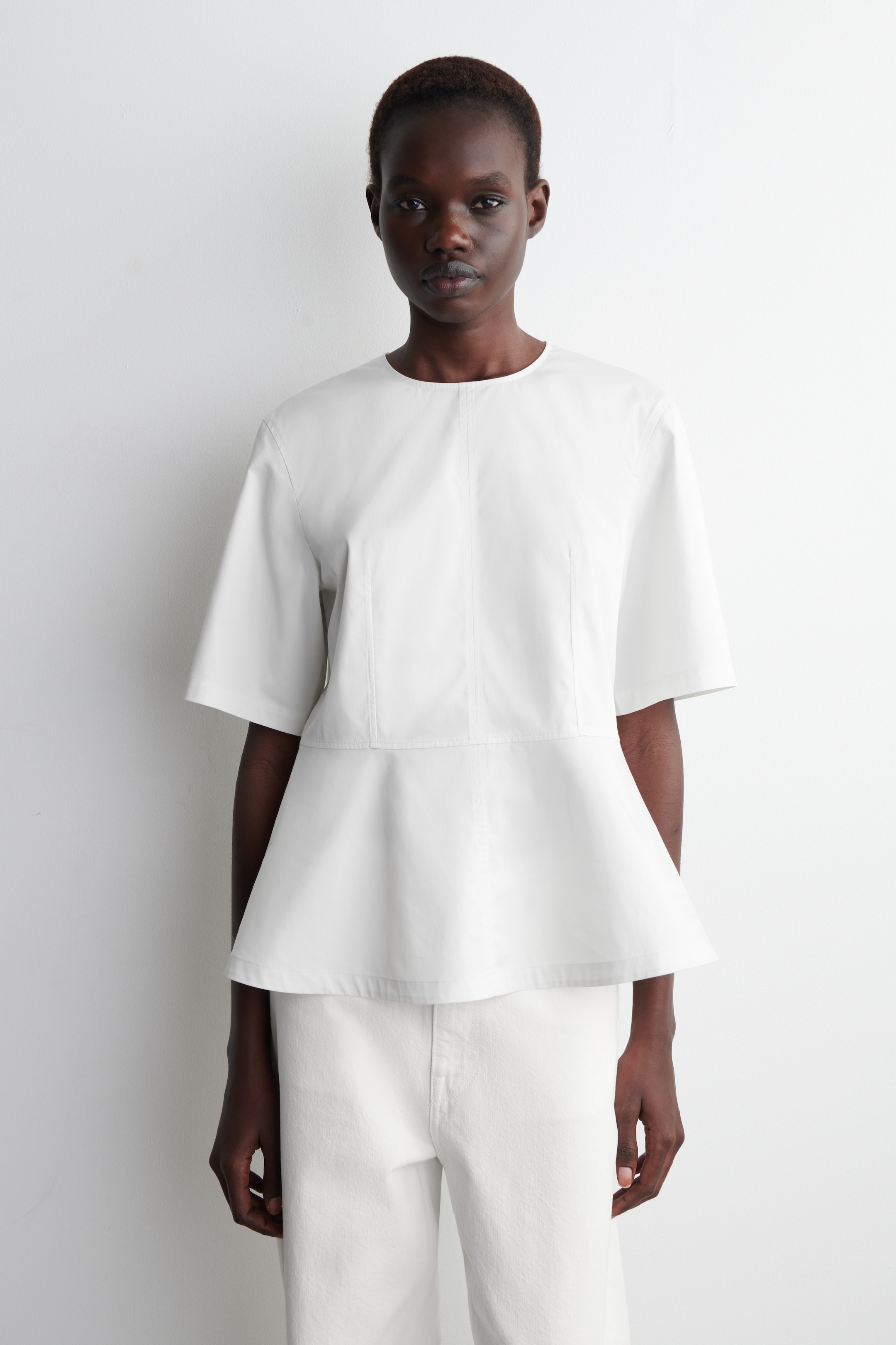 Zobrazit větší obrázek: BAVLNĚNÝ TOP S VOLÁNEM - BÍLÁ - ŽENY | H&M CZ 1