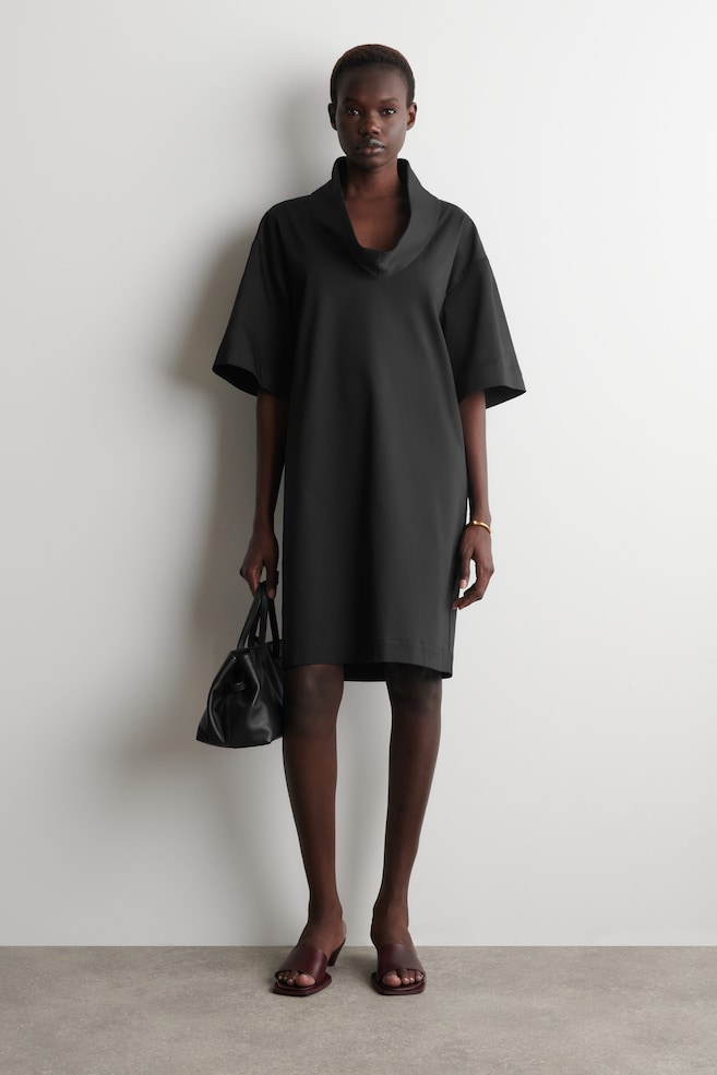 MOCK-NECK COCOON MINI DRESS — BLACK