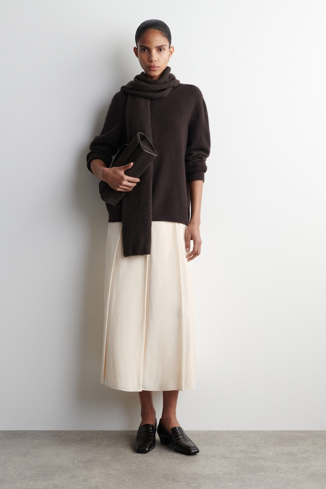 PLEATED A-LINE MIDI SKIRT — CREAM