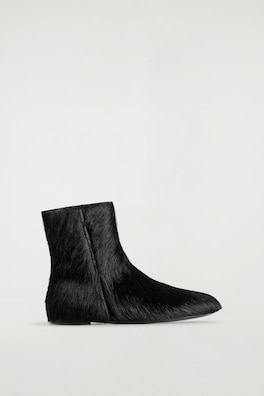 PONY HAIR-EFFECT LEATHER SOCK BOOTS — CARBON 1