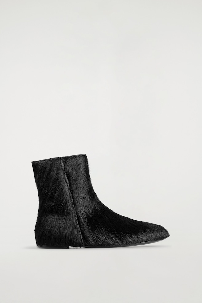PONY HAIR-EFFECT LEATHER SOCK BOOTS — CARBON