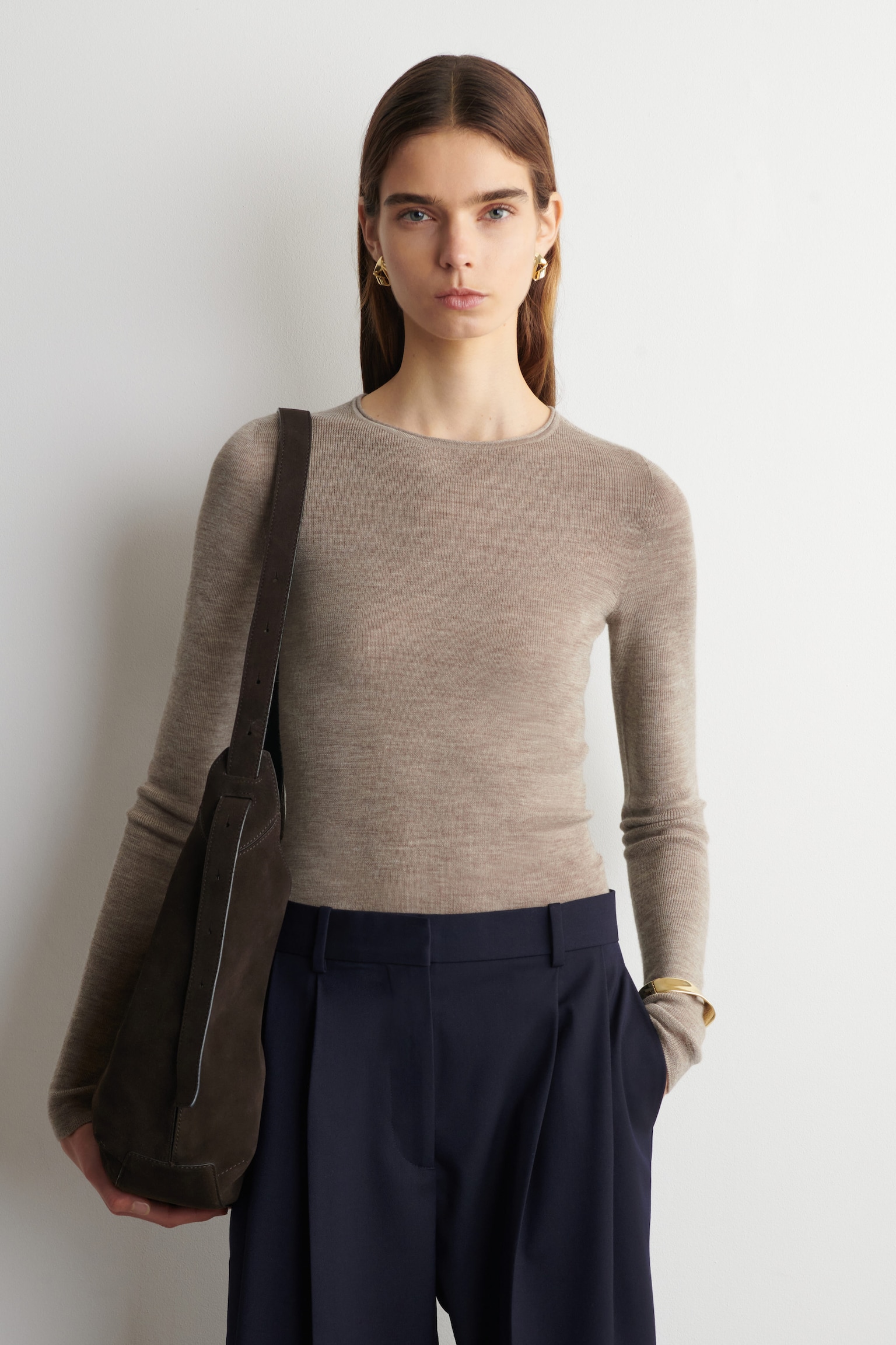 COS seamless merino wool long-sleeved top a lightweight layering top for warm-weather outfits