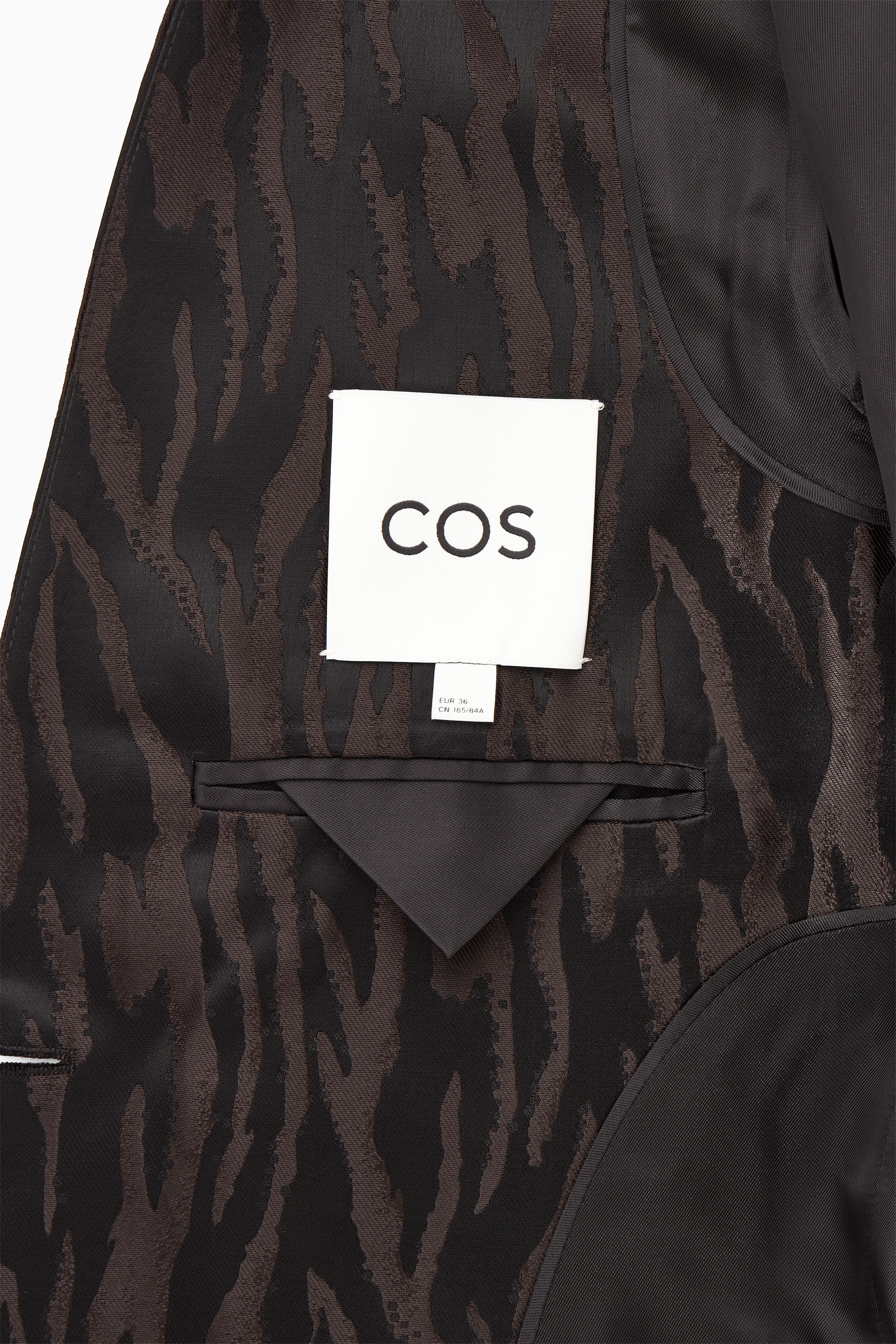 Ingrandisci l'immagine: RELAXED COLLARLESS ZEBRA-JACQUARD BLAZER - DARK BROWN / BLACK - DONNA | H&M CH 2