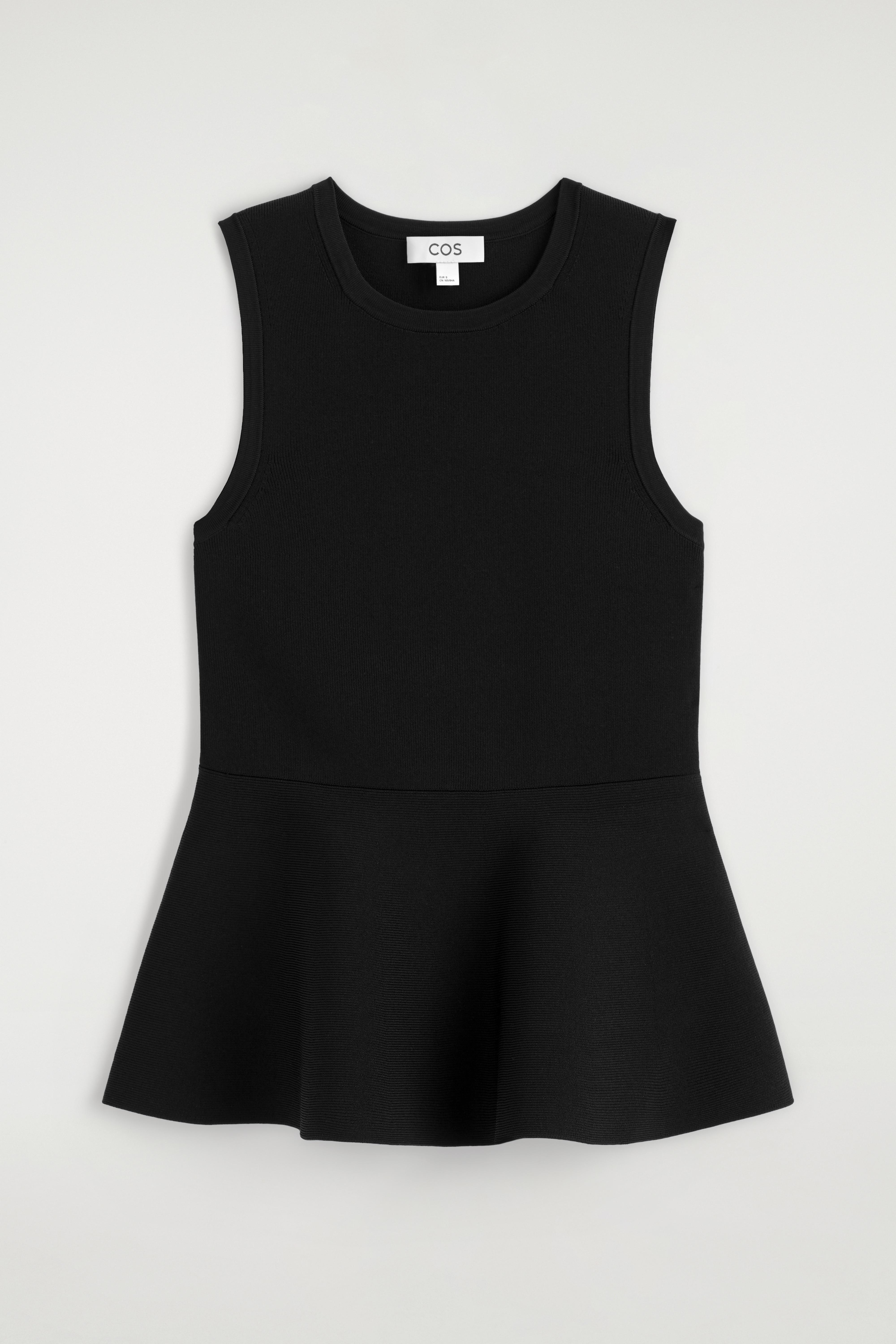 KNITTED PEPLUM TOP - שחור