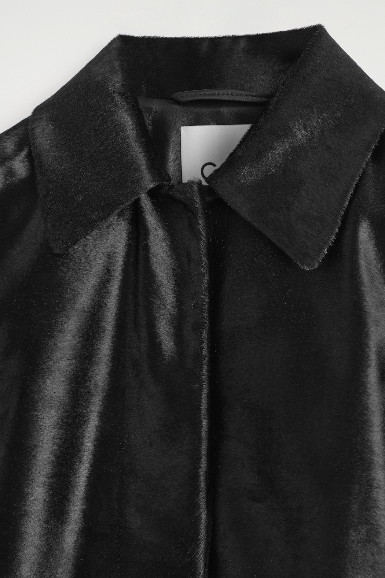 PONY HAIR-EFFECT LEATHER JACKET — BLACK