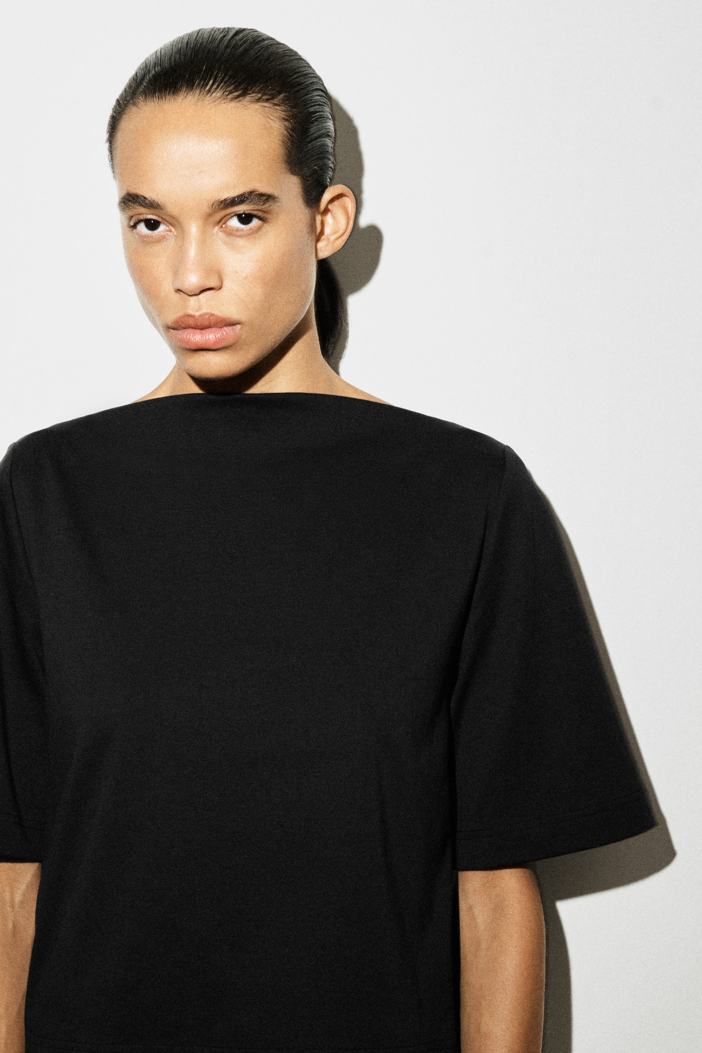 CONTRAST-PANEL BOAT-NECK MIDI DRESS - BLACK | COS US