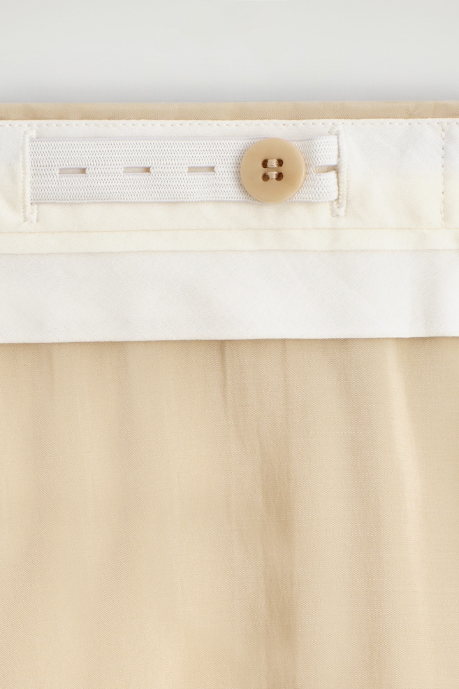 FLUID PLEATED CULOTTES — BEIGE