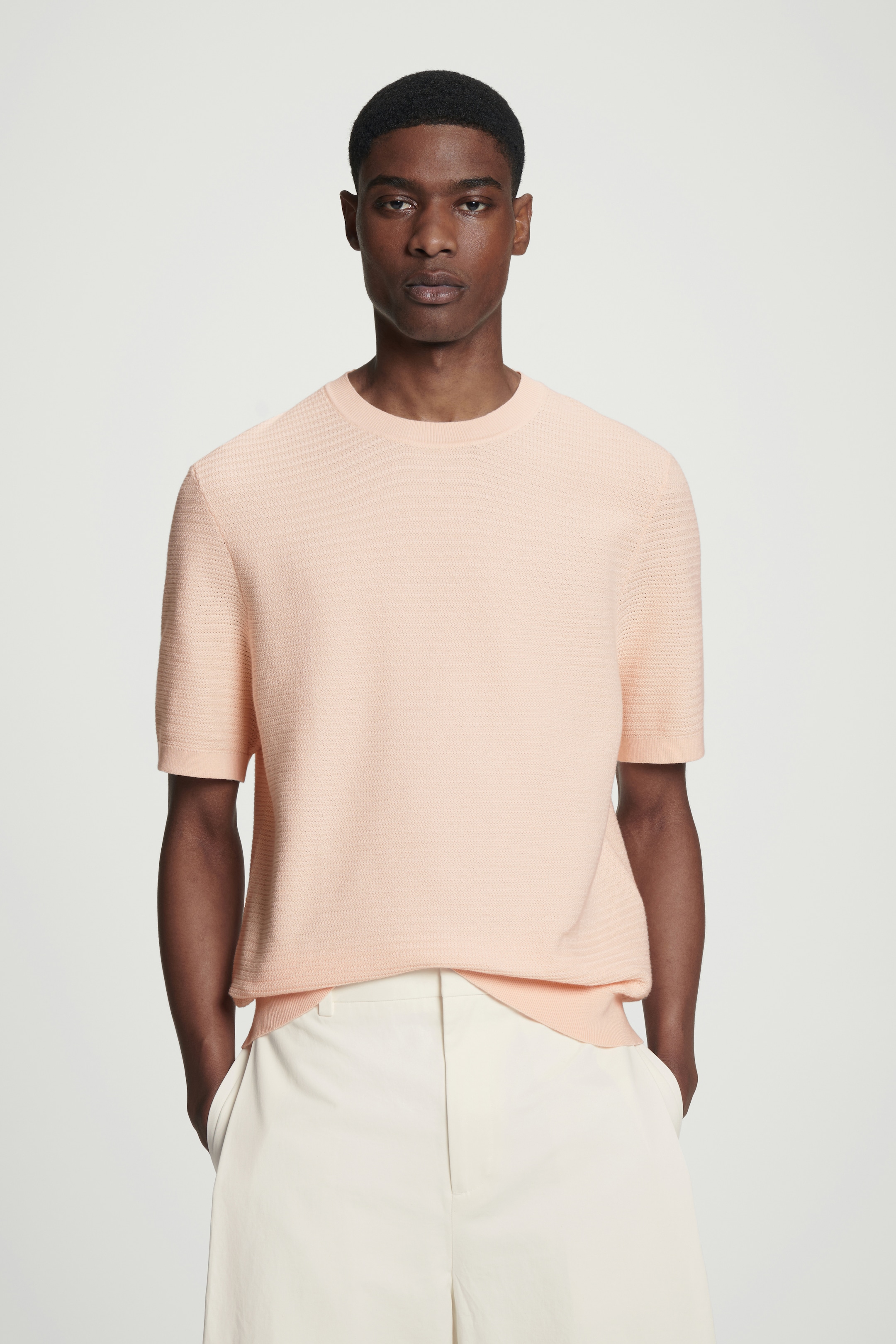 Visualizza immagine più grande: T-SHIRT IN MAGLIA DI COTONE TESTURIZZATA - ALBICOCCA - UOMO | H&M IT 1