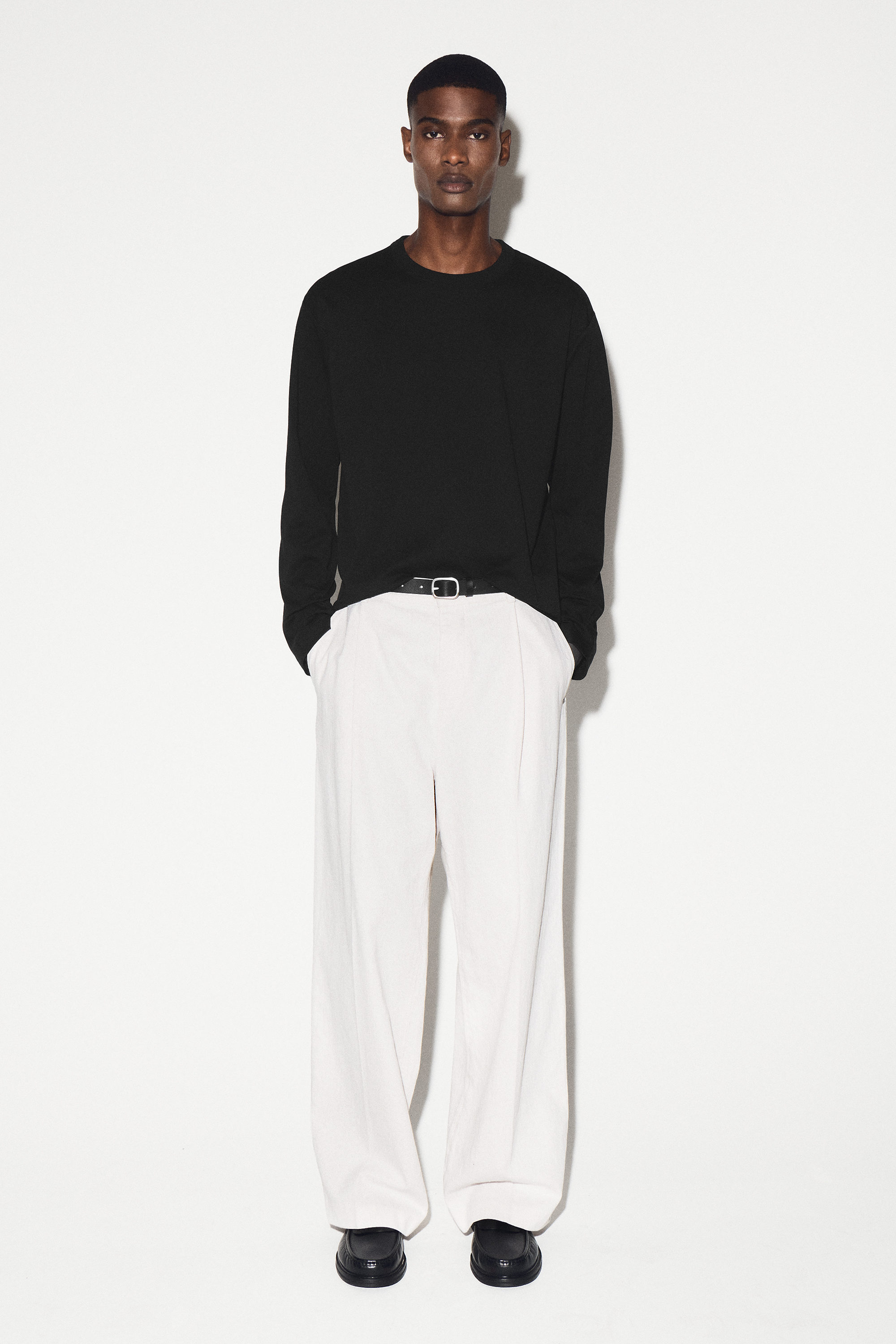 RELAXED JERSEY INTERLOCK LONG-SLEEVED T-SHIRT - BLACK | COS US