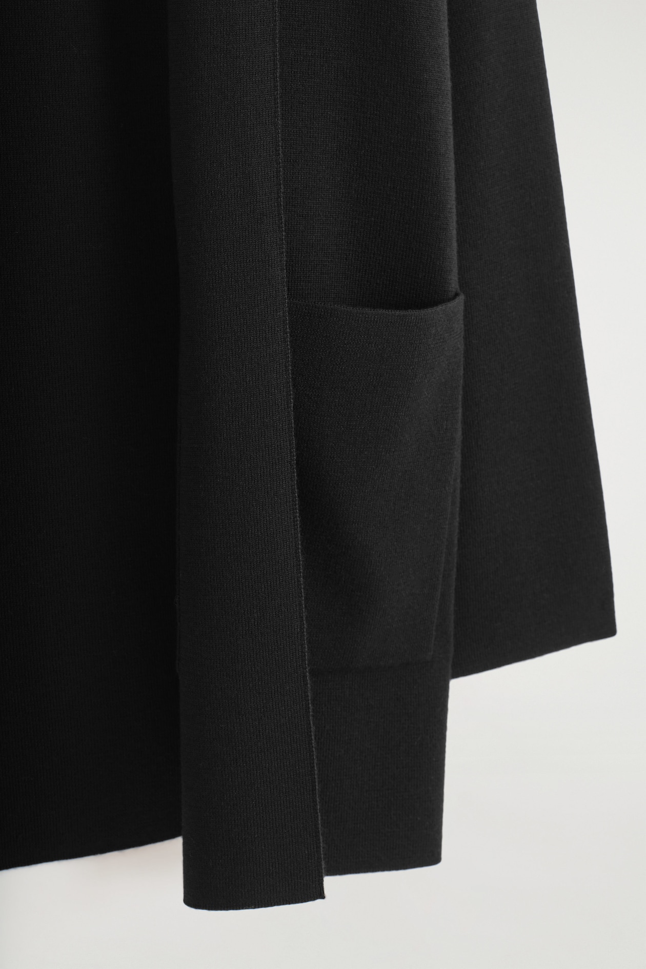 DRAPED-COLLAR MERINO WOOL CARDIGAN — BLACK
