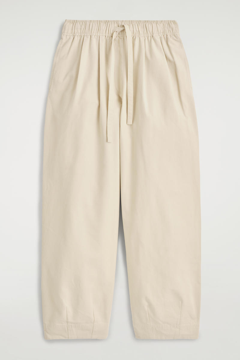 Cos Cotton Tapered Drawstring Trousers In Beige In Sand
