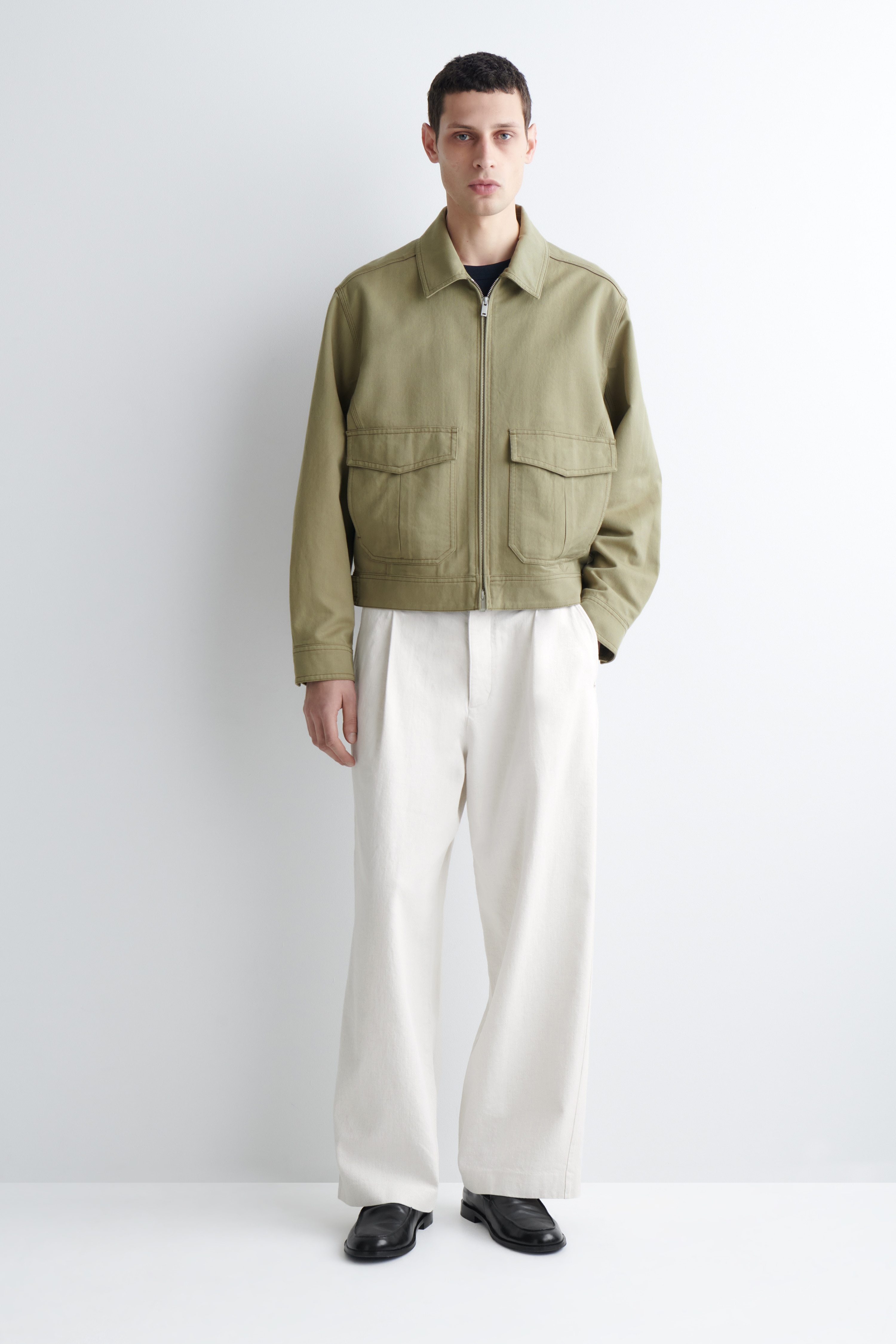 PANTALONI IN DENIM A GAMBA LARGA CON PIEGA - BIANCO/INDACO/NERO