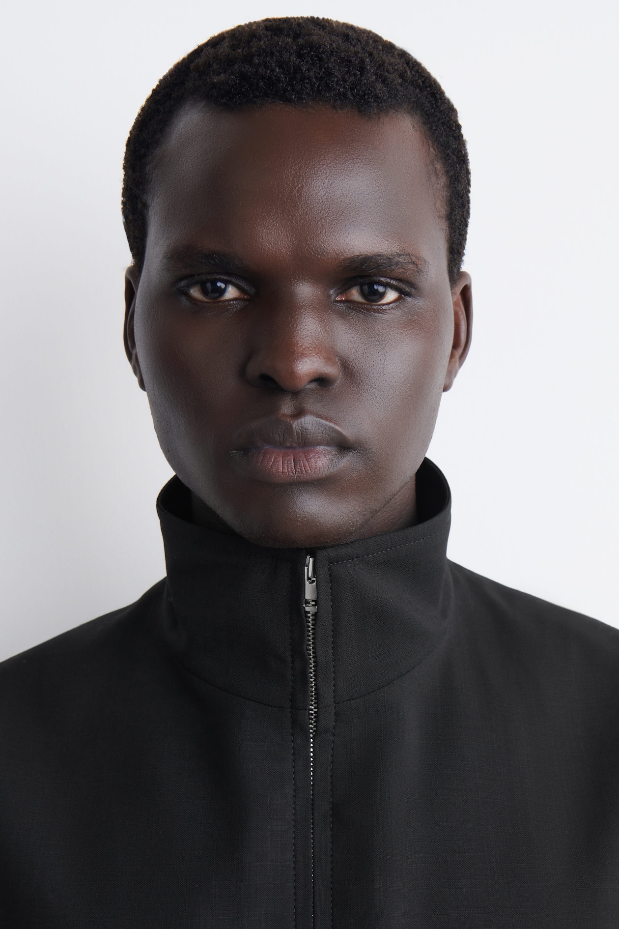 TAILORED FUNNEL-NECK WOOL GILET — CARBON