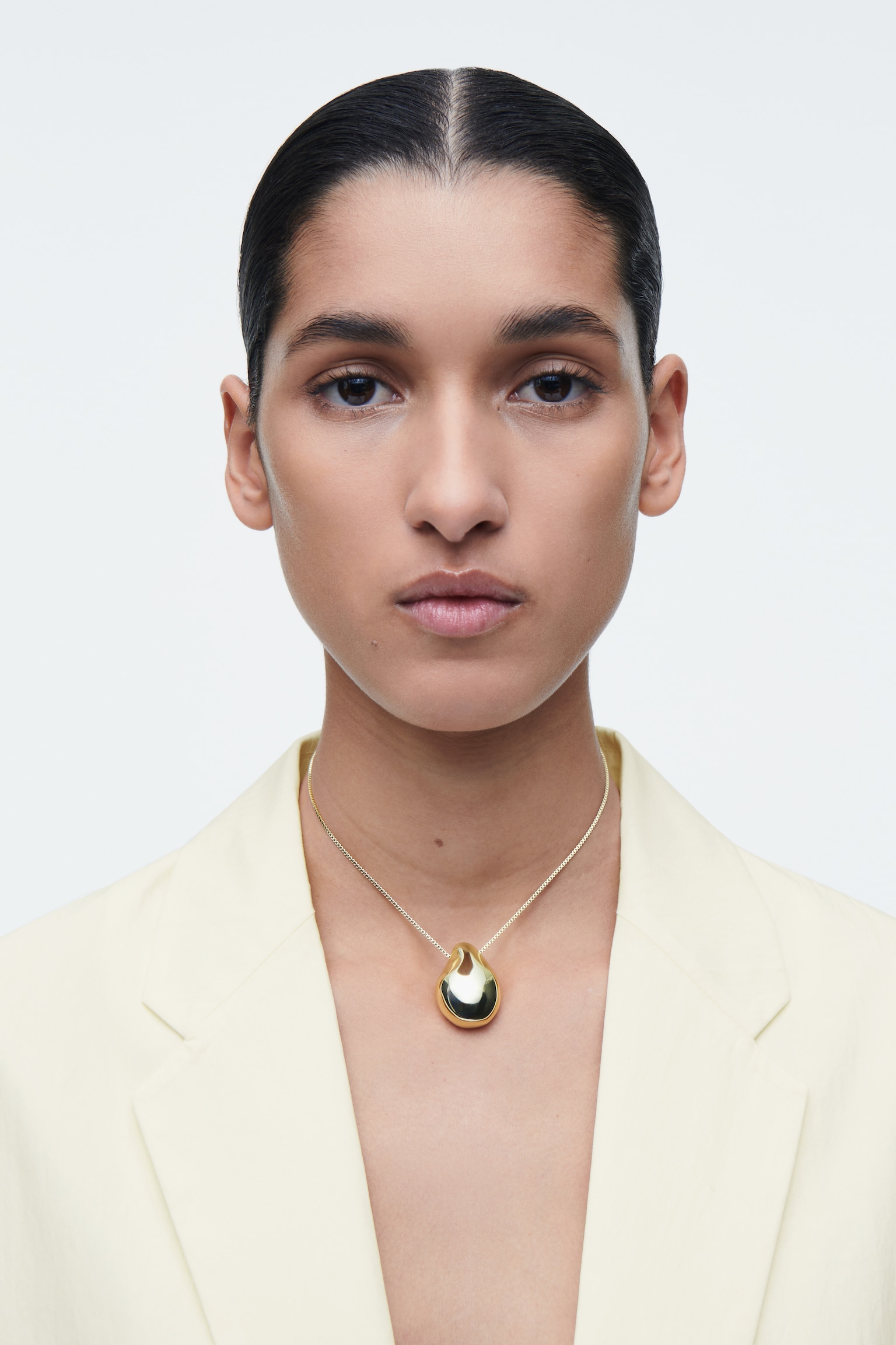 COLLIER À PENDENTIF FAÇON GALET - DORÉ