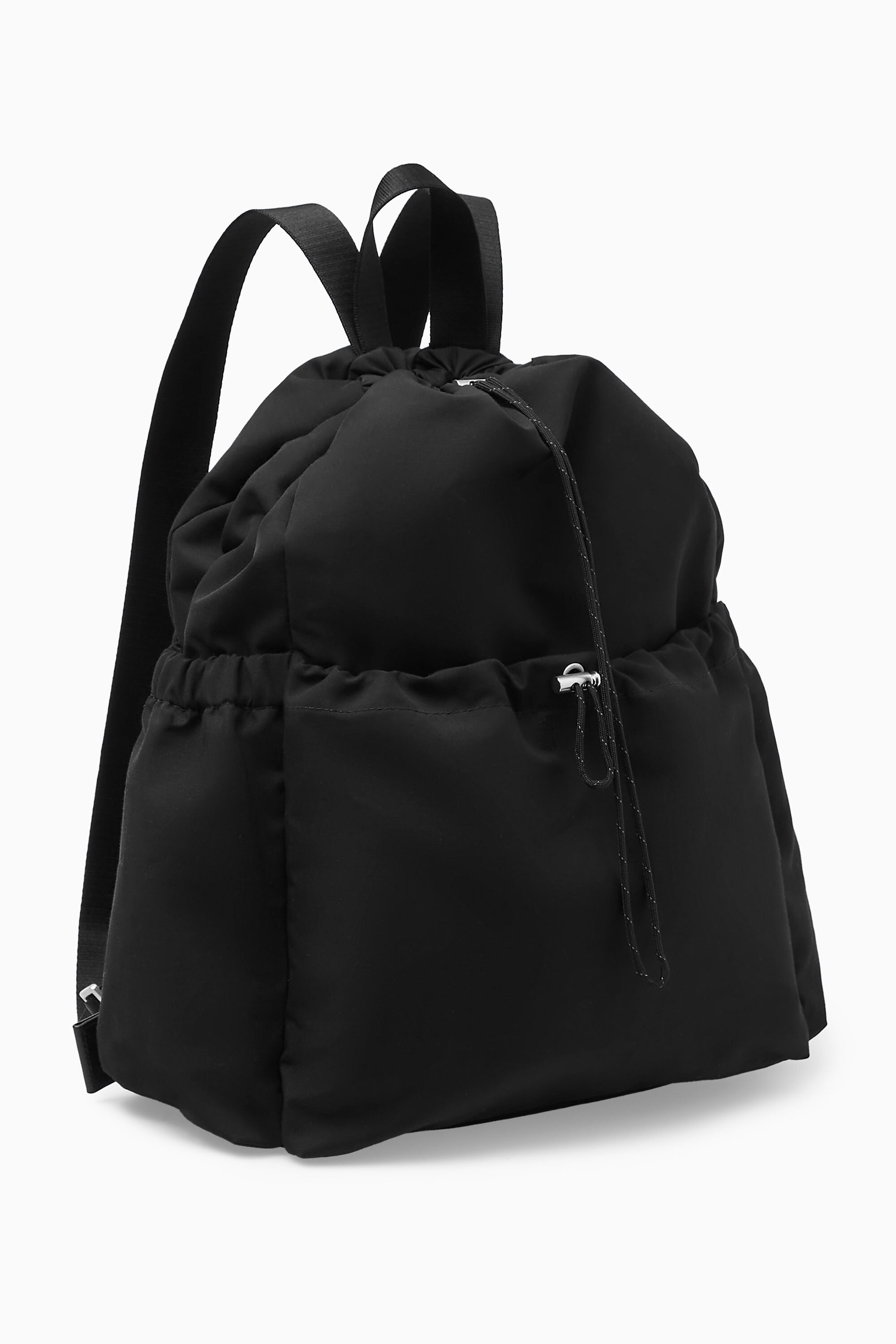 DRAWSTRING BACKPACK - BLACK | COS