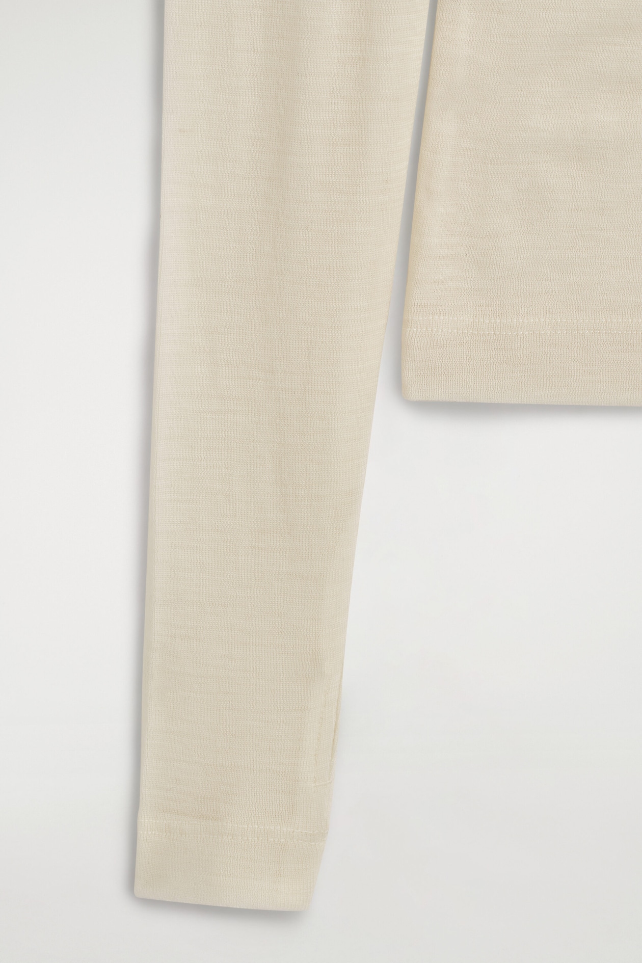 MERINO WOOL BUTTONED MOCK-NECK TOP — IVORY