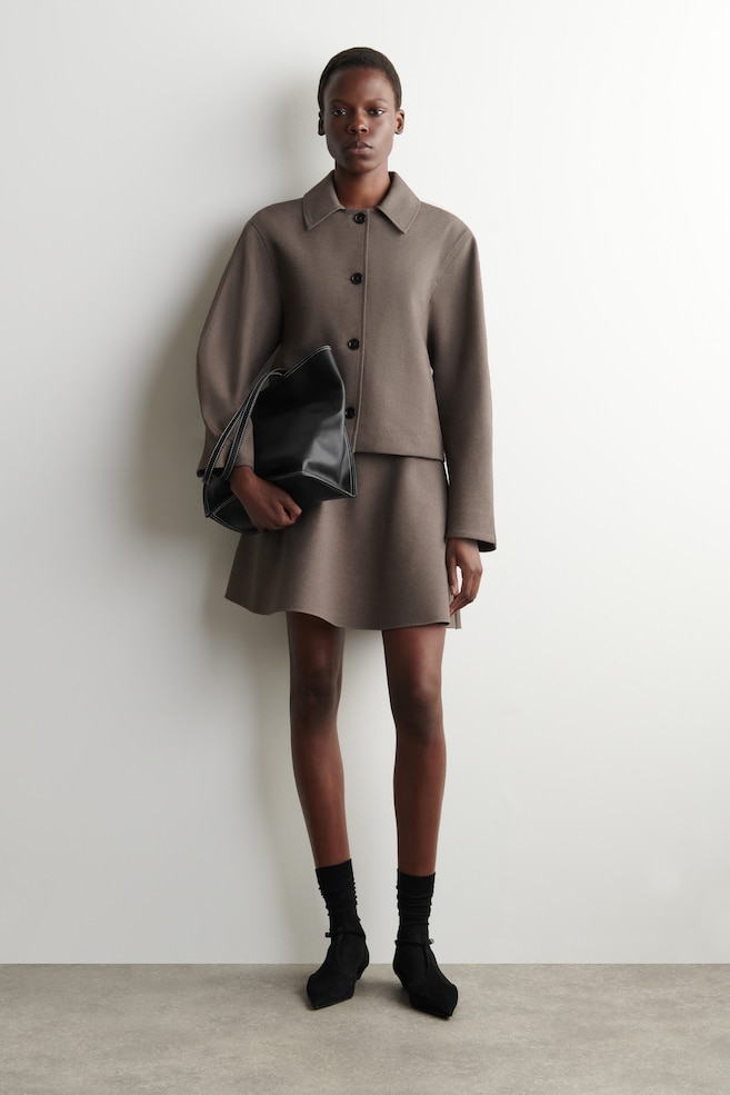 FLARED JERSEY MINI SKIRT — BROWN
