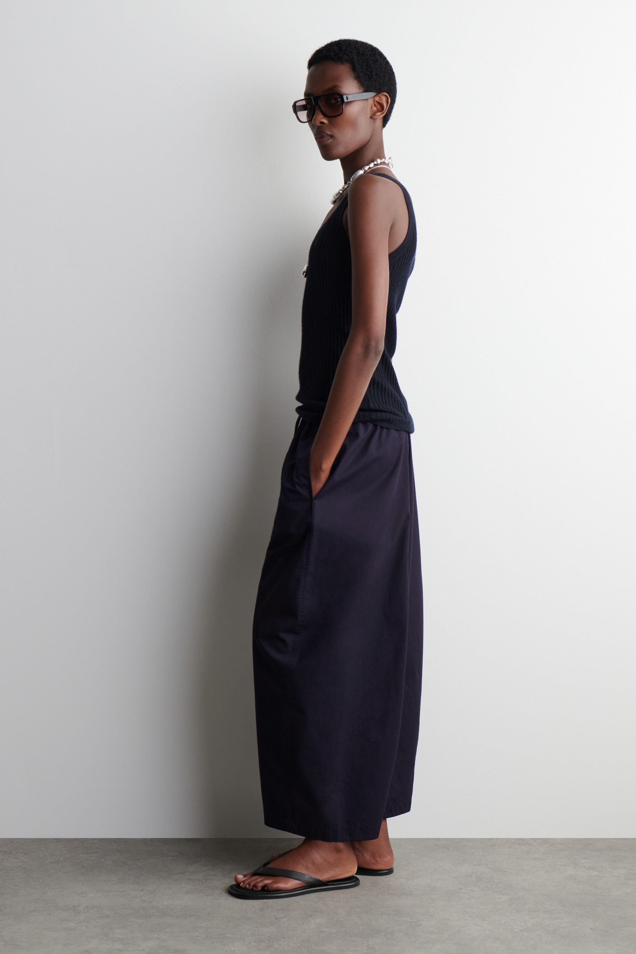 ELASTICATED BARREL-LEG TROUSERS