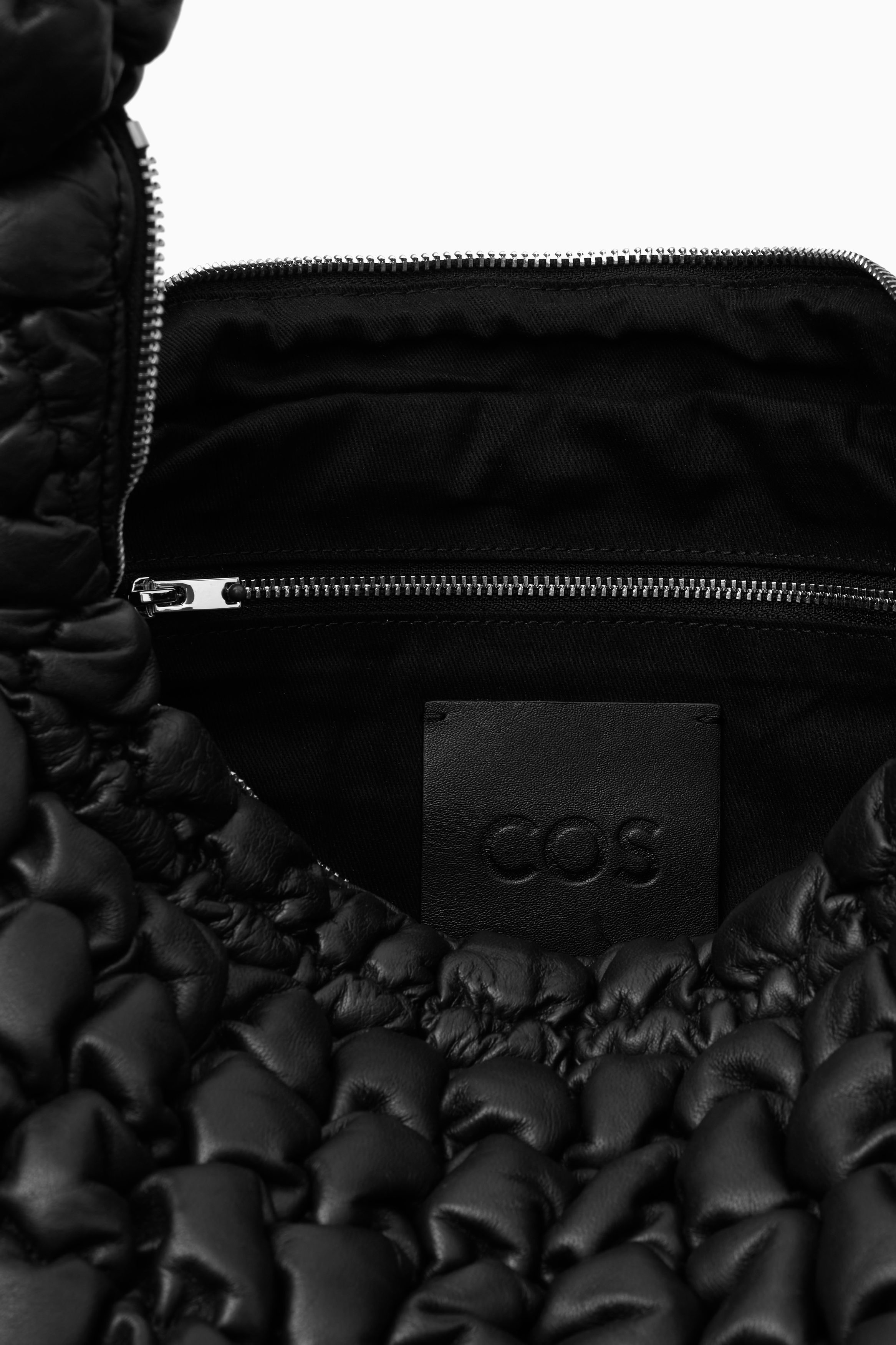 QUILTED OVERSIZED CROSSBODY BAG - LEATHER - BLACK | COS