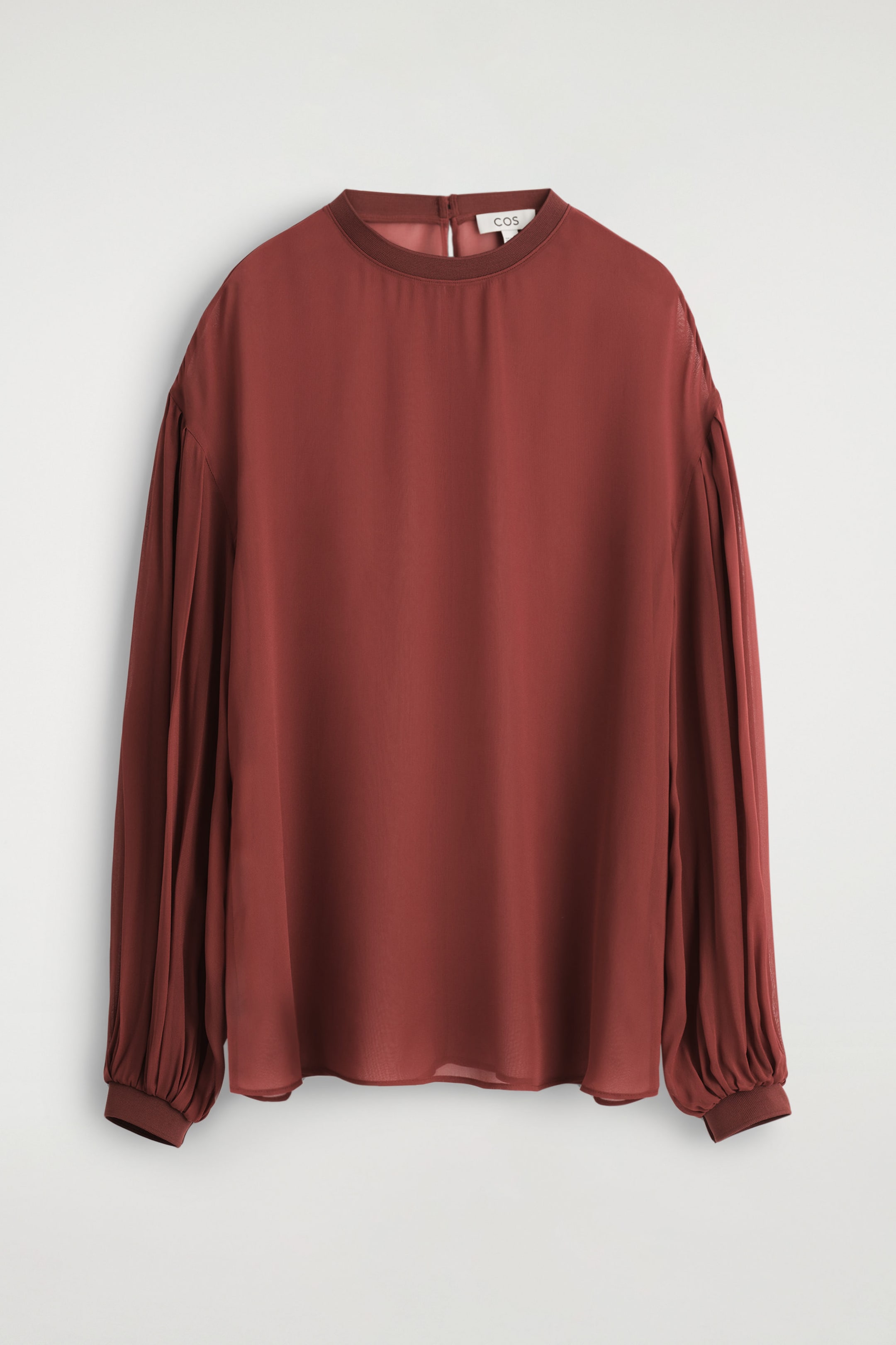 BLUSA TRASPARENTE CON MANICHE A PALLONCINO