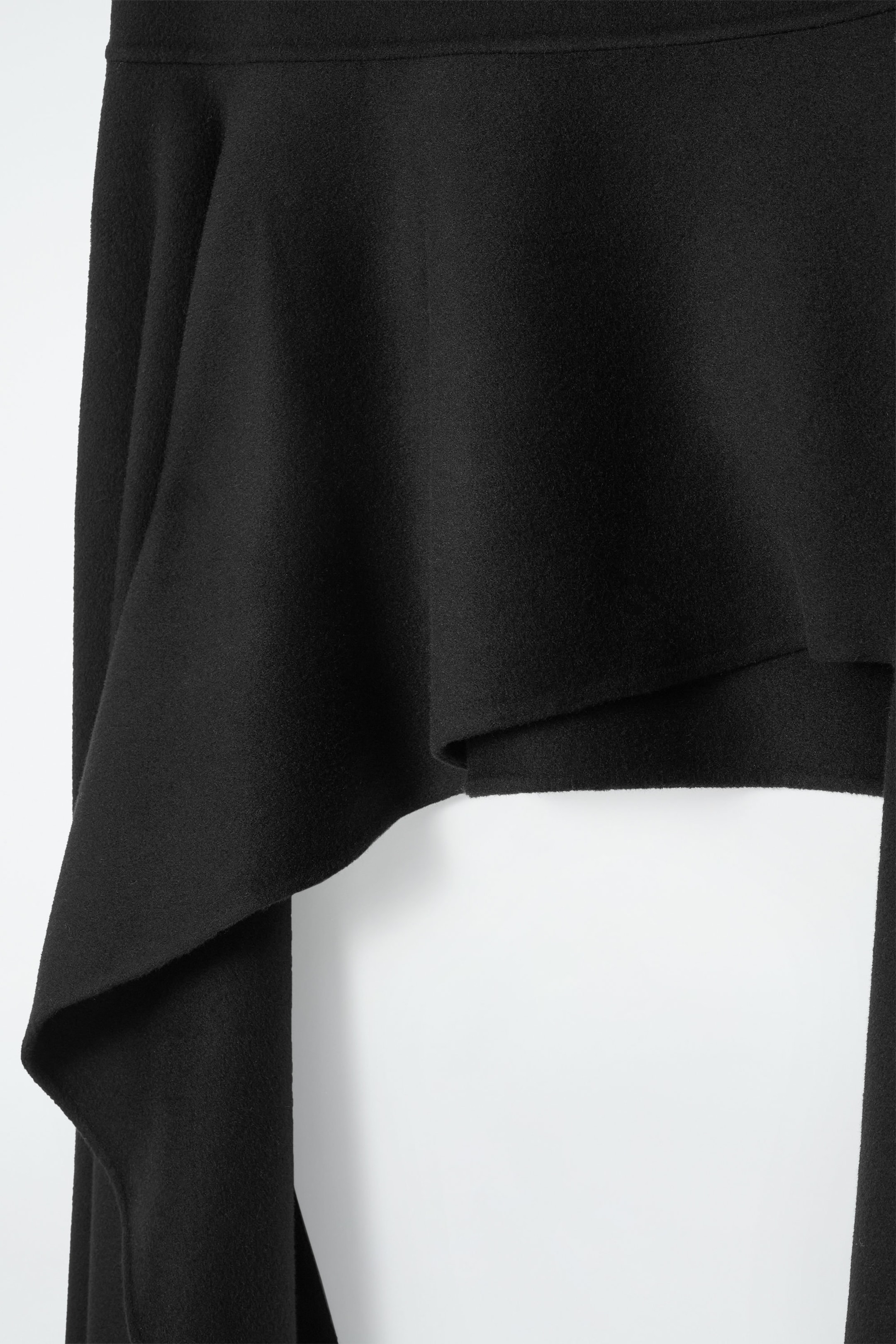THE DOUBLE-FACED ASYMMETRIC SKIRT