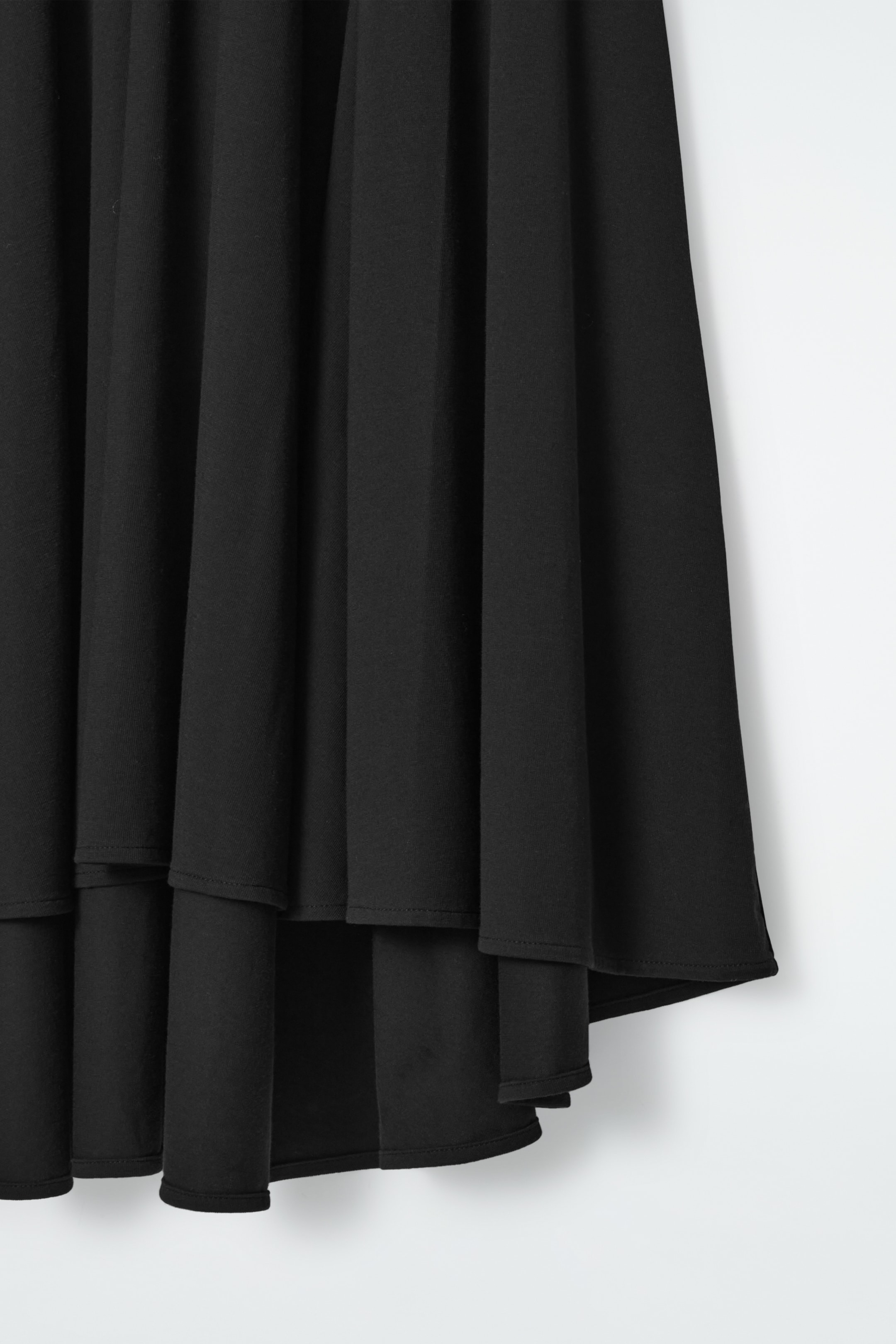 Ingrandisci l'immagine: FLARED ASYMMETRIC MIDI SKIRT - BLACK - DONNA | H&M CH 2
