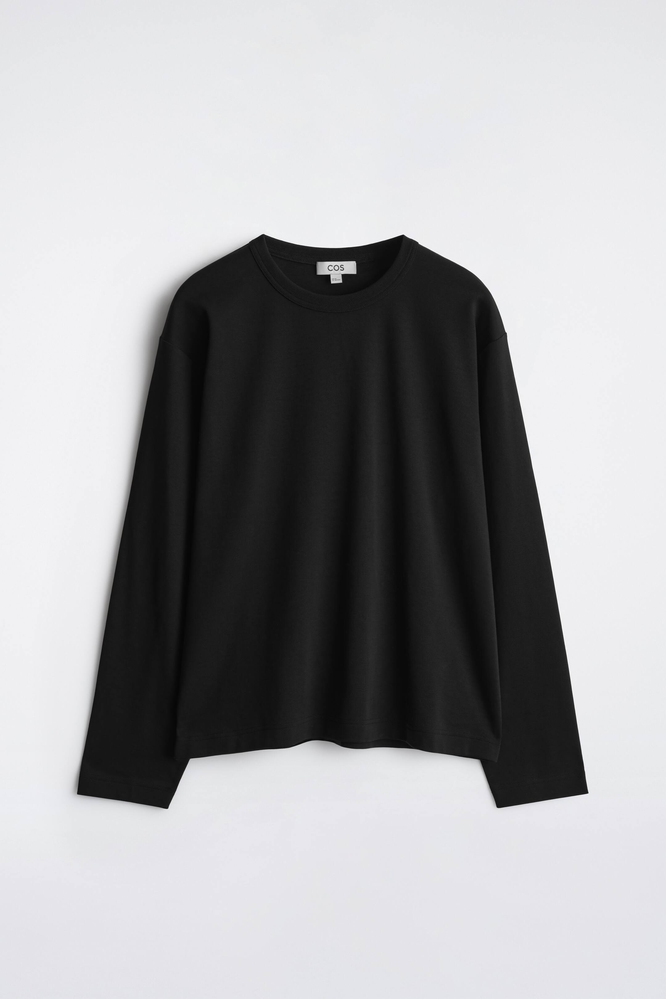 Visualizza immagine più grande: T-SHIRT A MANICHE LUNGHE IN JERSEY INTERLOCK - NERO - UOMO | H&M IT 1