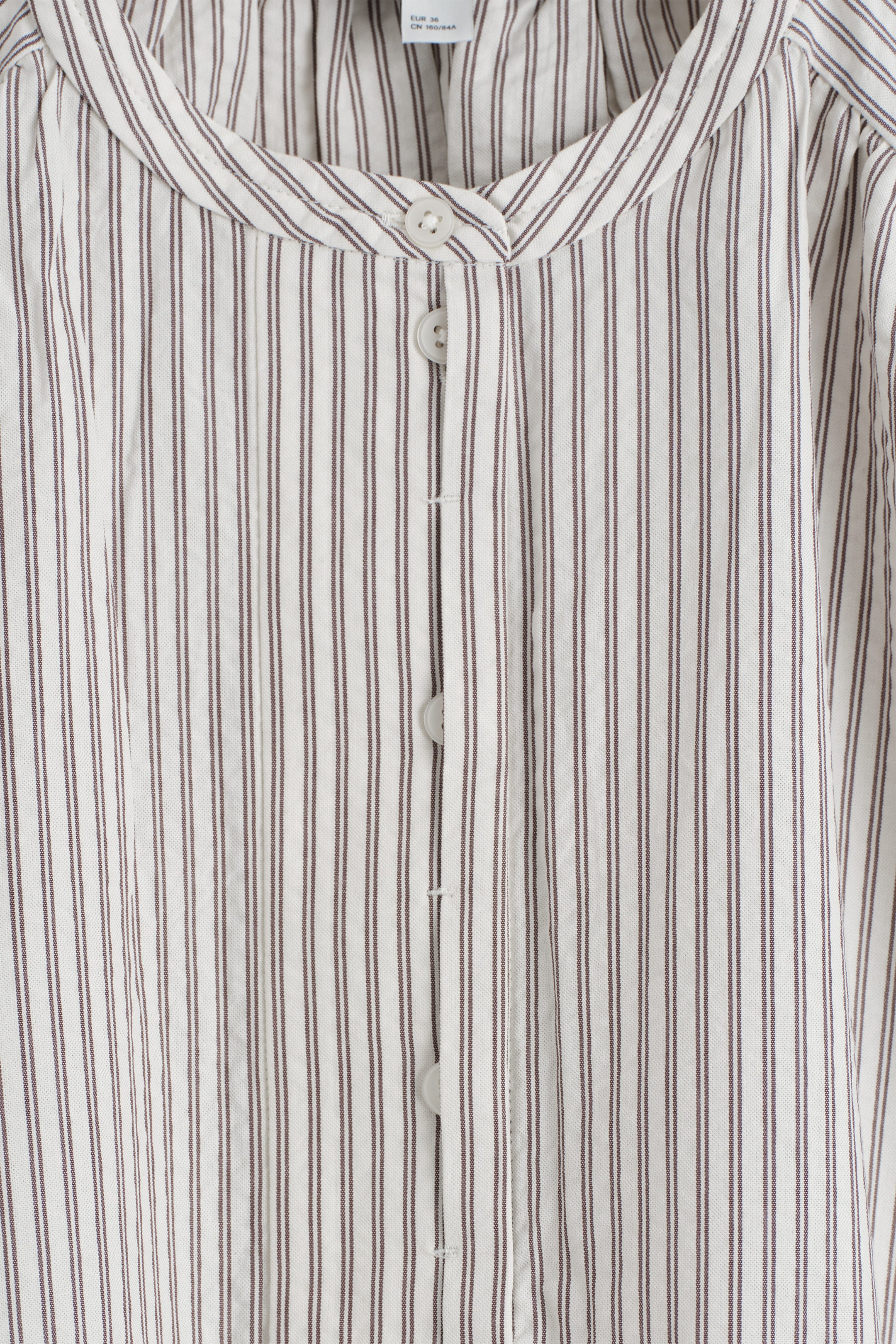 STRIPED SEERSUCKER FLAREDSLEEVE BLOUSE