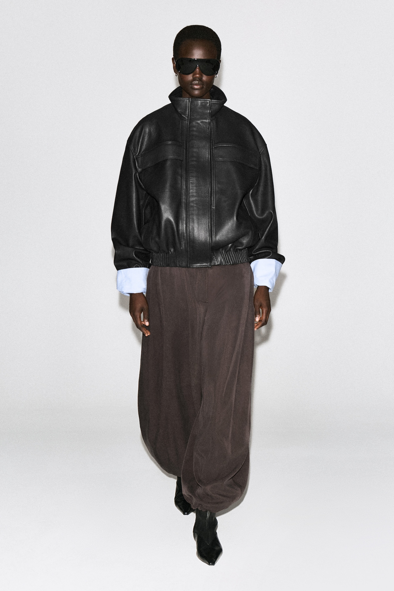 LEATHER MOCK-NECK BOMBER JACKET — BLACK