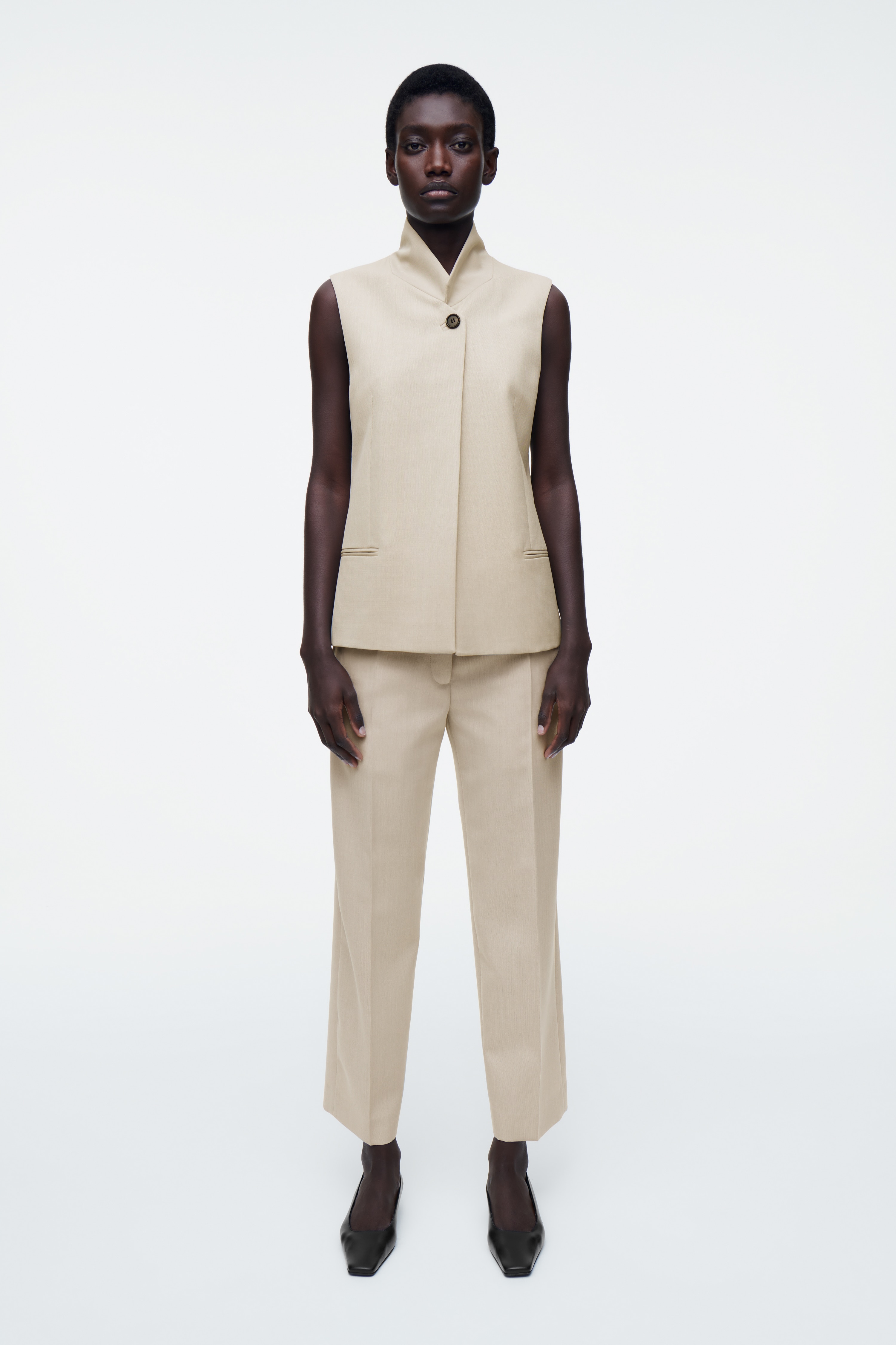 VLNĚNÉ ZÚŽENÉ KALHOTY - BÉŽOVÁ