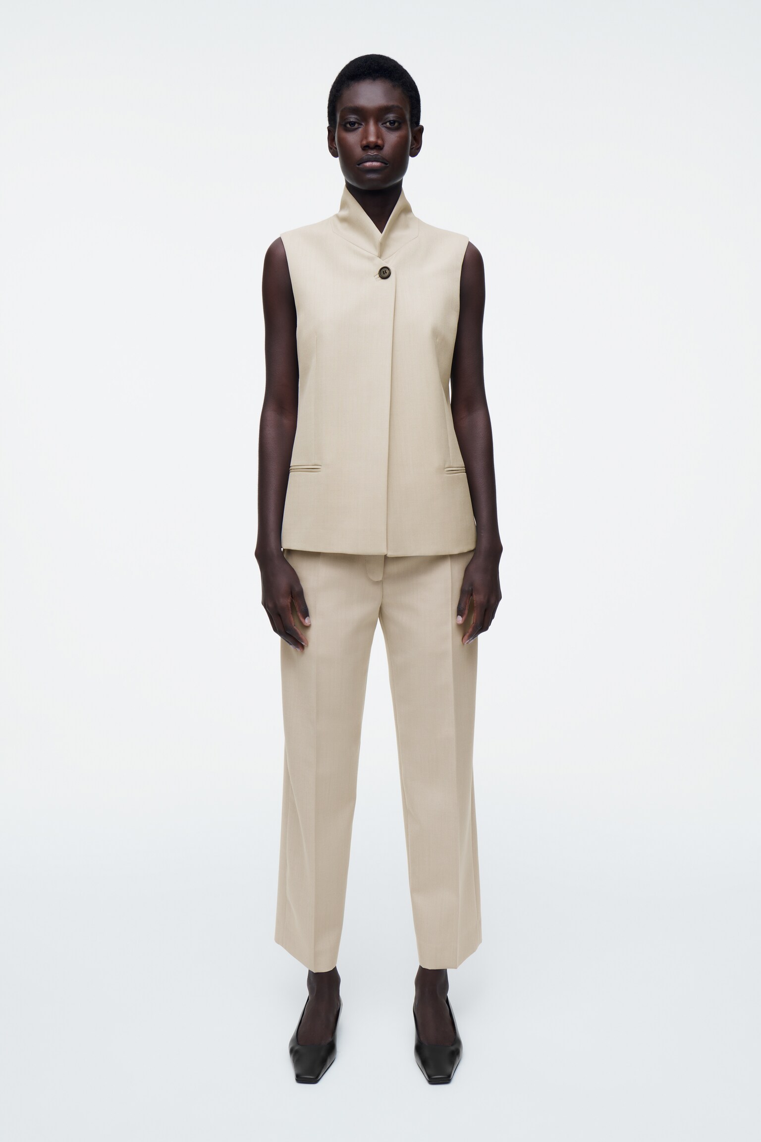 PANTALONES DE LANA SLIM FIT - BEIGE