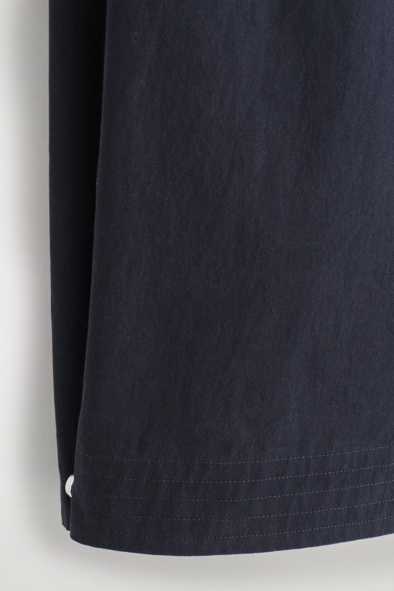 PIMA COTTON BARREL-LEG TROUSERS — NAVY