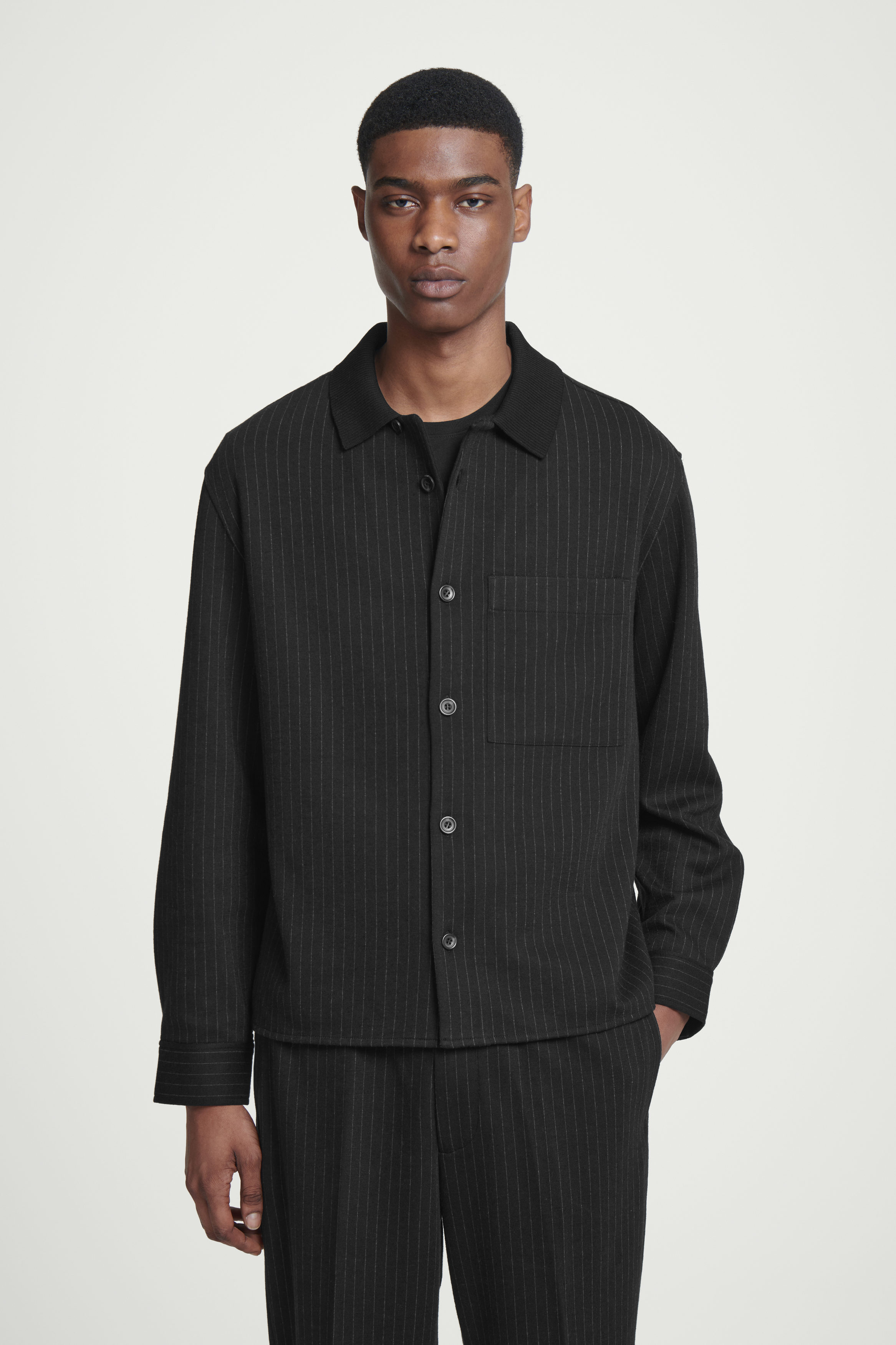 RELAXED PINSTRIPED WOOL-BLEND JERSEY SHIRT - BLACK