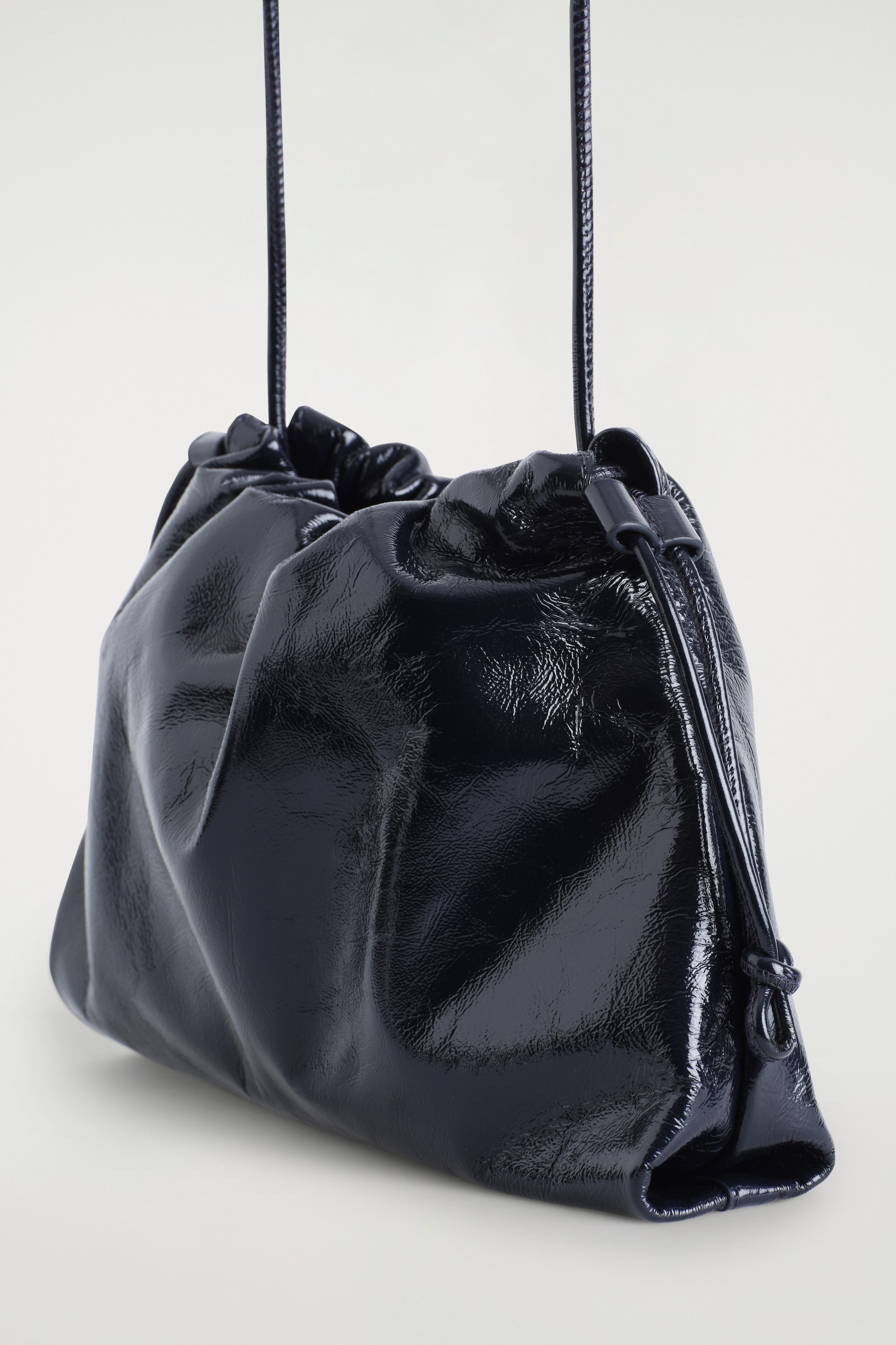 MINI CAVATELLI CLUTCH BAG - LEATHER